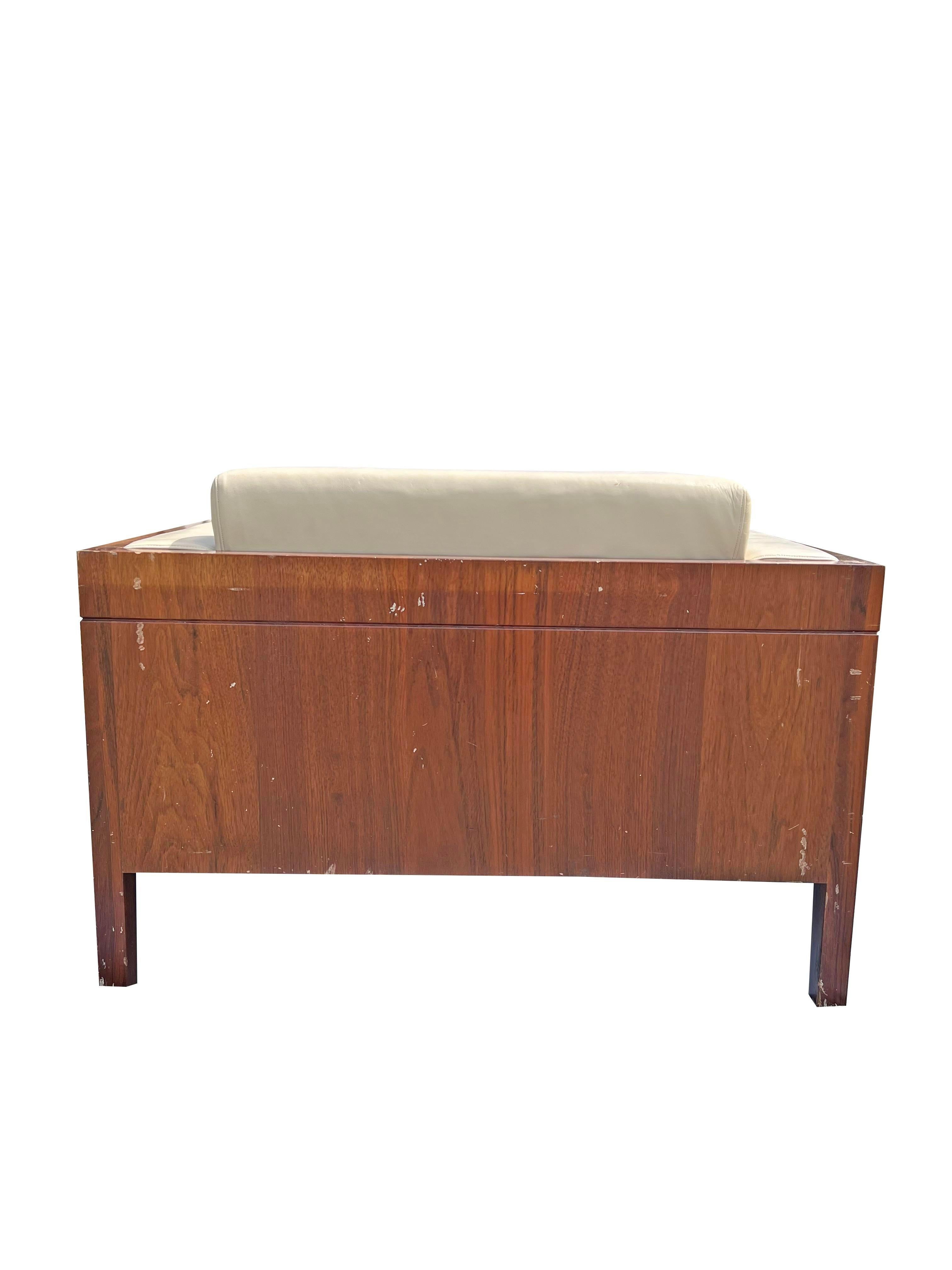 Vintage Modern Cube Case Leather Lounge Chair and Ottoman in Milo Baughman/Herman Miller Style.

Indulge in mid-century modern luxury with this stunning Vintage Modern Cube Case Leather Lounge Chair and Ottoman. Inspired by the iconic designs of