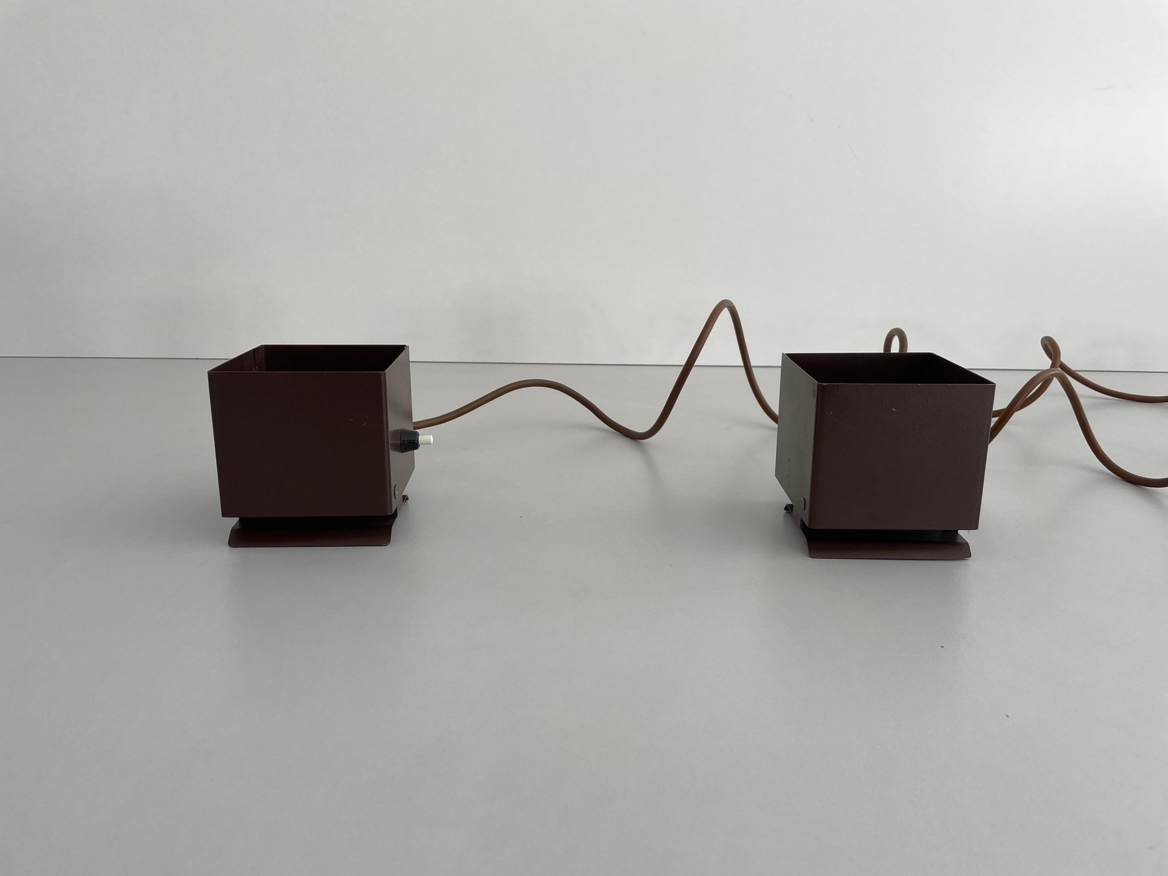 Cube Design Pair of Wall Lamps by Rudolf von Prusky, 1970s, Germany

Very elegant and minimal design wall lamps
Lamp is in very good condition.

These lamps works with E14 standard light bulbs. 
Wired and suitable to use in all countries. (110-220