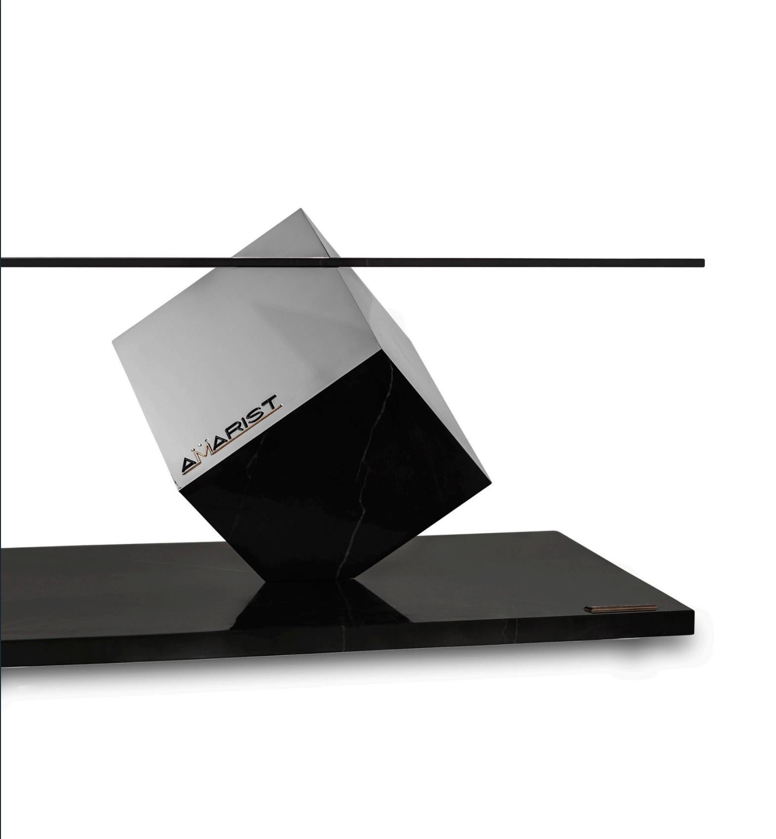 The Cube Essentia centre/coffee table bespeaks the inherent beauty of simplicity. Altogether cosmopolitan, minimalist, and extremely elegant, this piece serves as a statement piece in any space. The design began as a search to find the pure essence