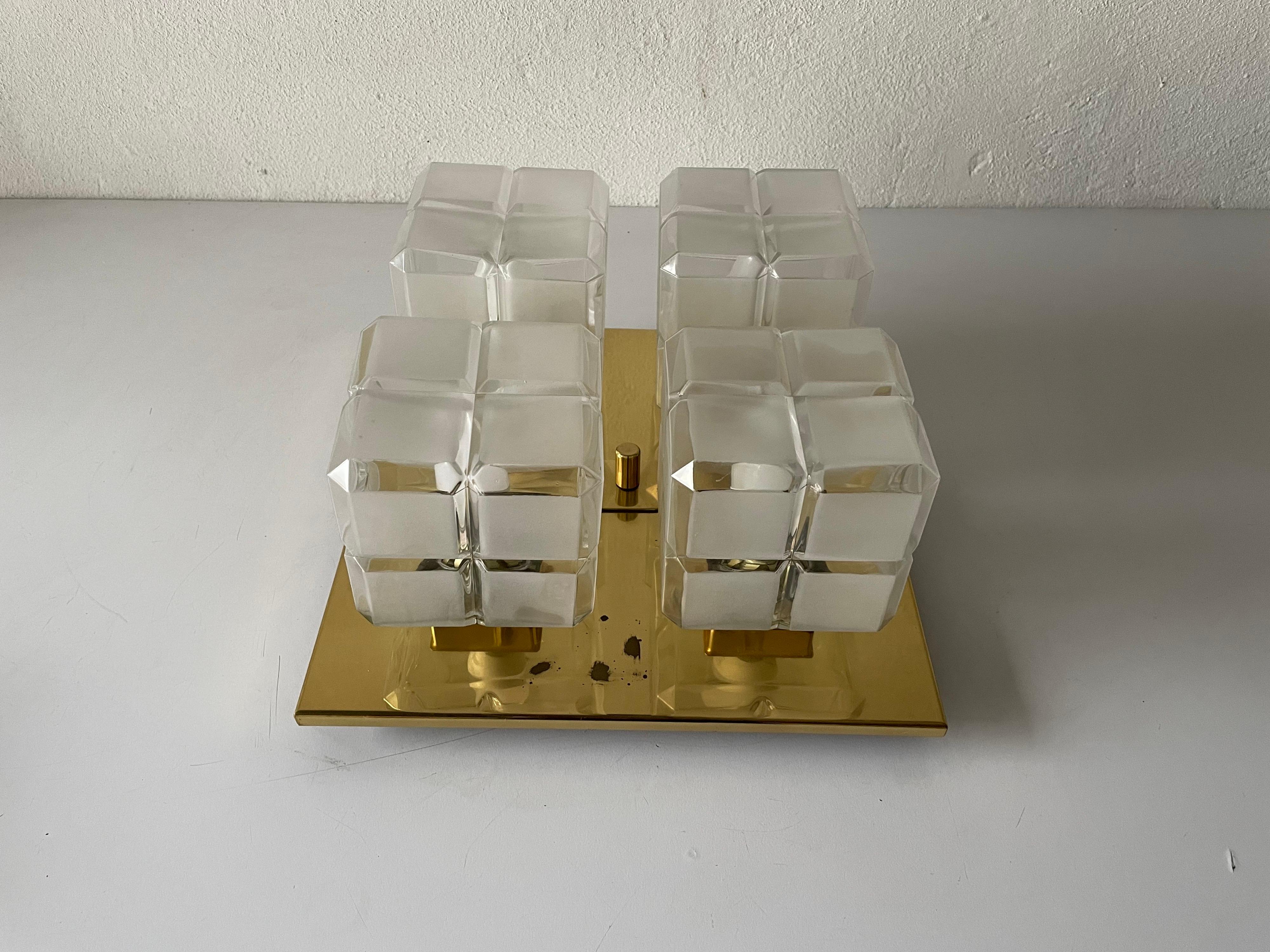 Wonderful cube glass and brass flush mount light by Kalmar Leuchten, 1960s, Germany

Lampshade is in very good vintage condition.

This lamp works with 4xE14 light bulbs. 
Wired and suitable to use with 220V and 110V for all