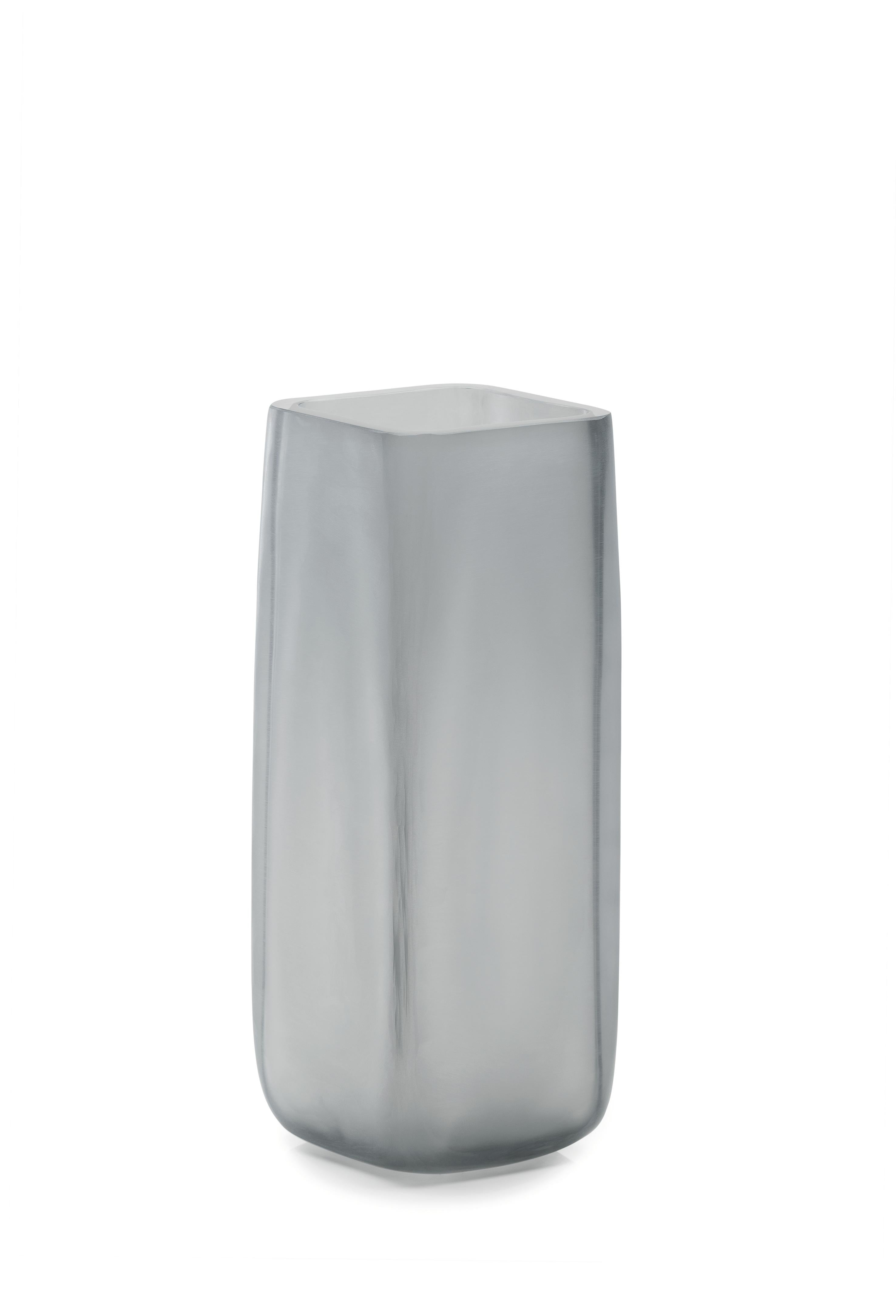 Cube Grey Vase by Purho
Dimensions: D10 x H40 cm
Materials: Glass
Other colours available.

Purho is a new protagonist of made in Italy design, a work of synthesis, a research that has lasted for years, an Italian soul and an international