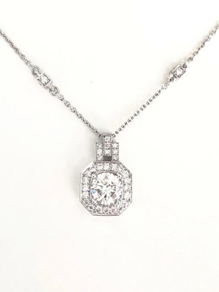 Fine detail in this Platinum Diamond Necklace, the center drop holds a 1.00 carat diamond in the center, surrounded by other round diamonds, the chain has sections of our unique diamond cube every 4 cm, total diamonds besides the center are 77 in