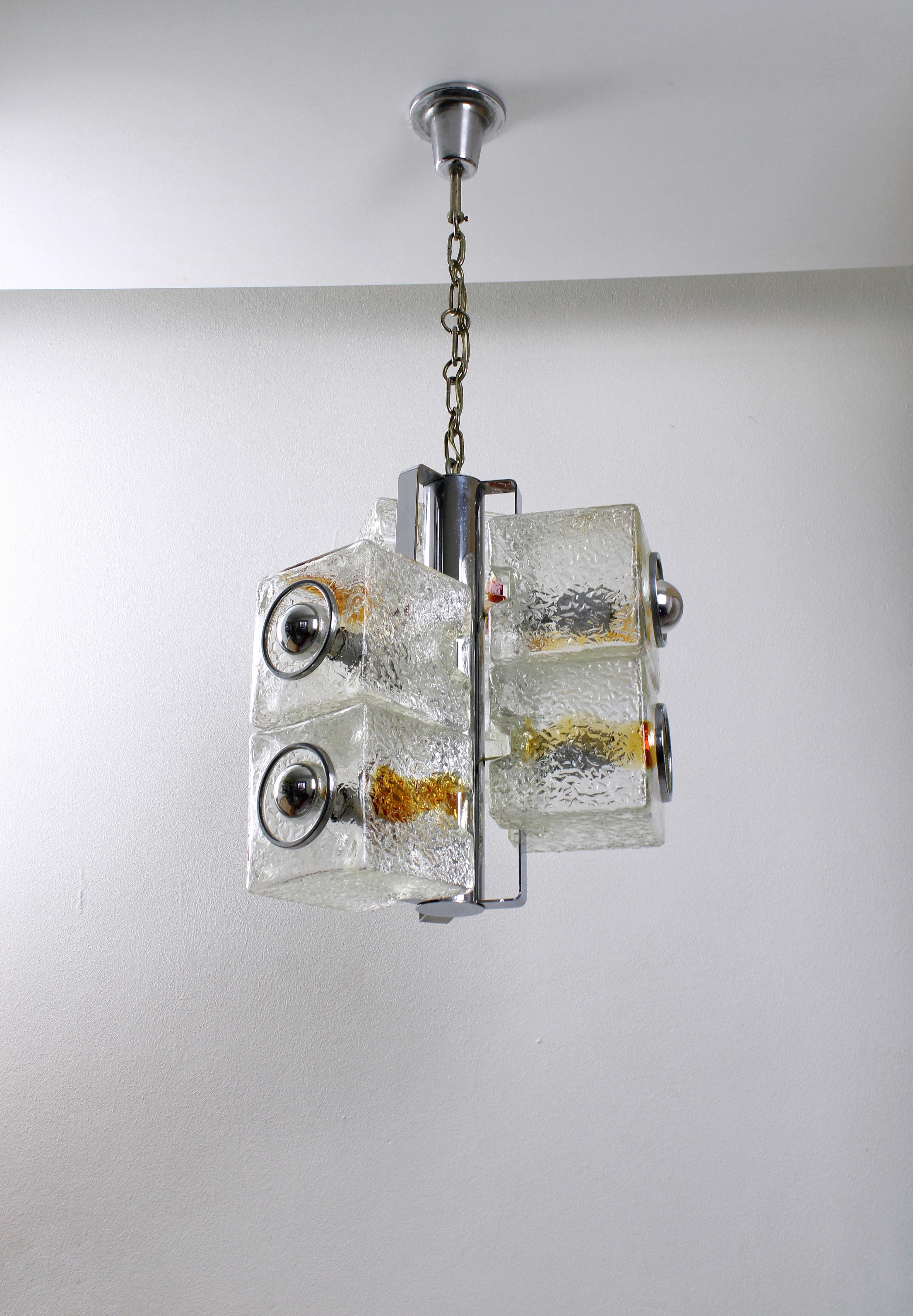 Large sculptural pendant lamp shaped with six glass cubes, held together by a chrome plated metal structure. Possibly designed by Toni Zuccheri. Manufactured by VeArt in Italy during the 1960s. The “Cube” series was produced in many different