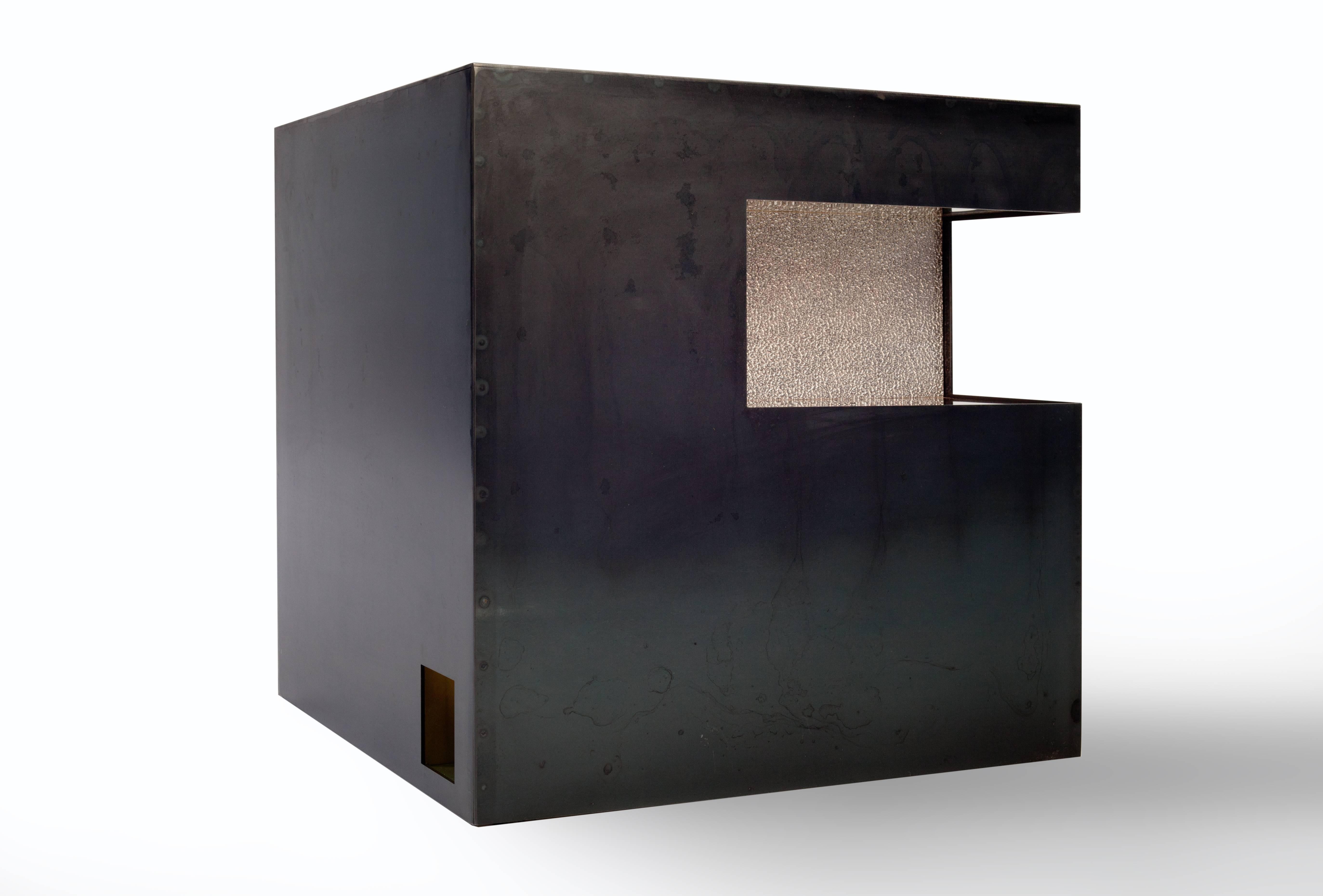 Very sculptural steel cube by interior designer Harry Clark. A very eye-catching piece of furniture in high end quality crafts.

