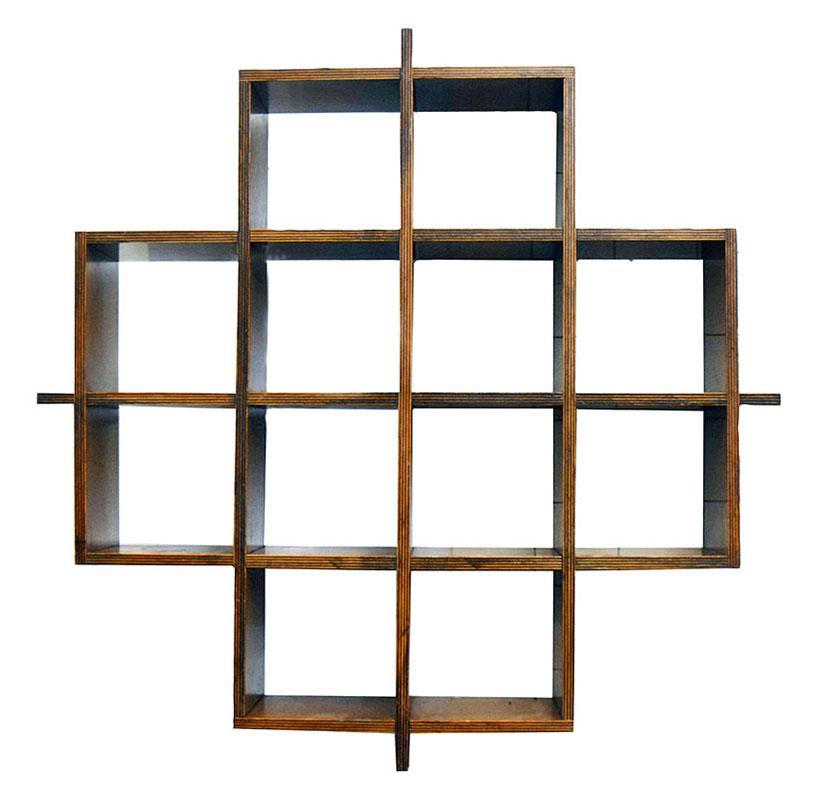 Wall bookcase in laminated wood, Italian production from the 70s.
Consisting of 12 cubic compartments measuring 25,5 x 25,5 x 25,5 centimeters each.
In excellent condition.