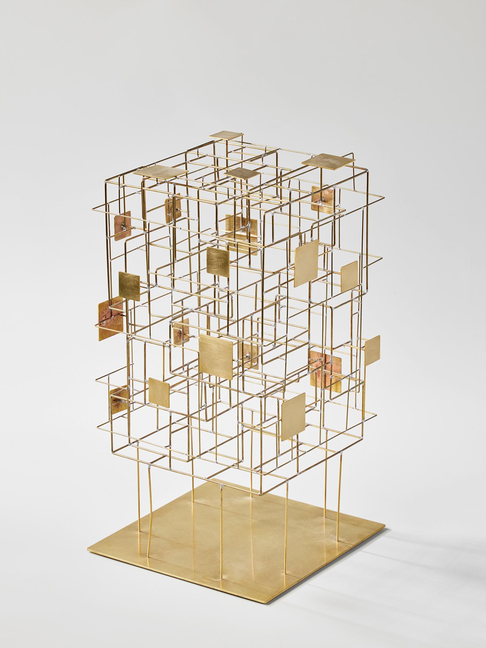 Cubique was created in 2021 by French designer Eric de Dormael. Handcrafted in brass, this is a unique piece.
Éric de Dormael is an unconventional artist, his trajectory far from the beaten track. Trained at the Saint-Luc school in Tournai and at