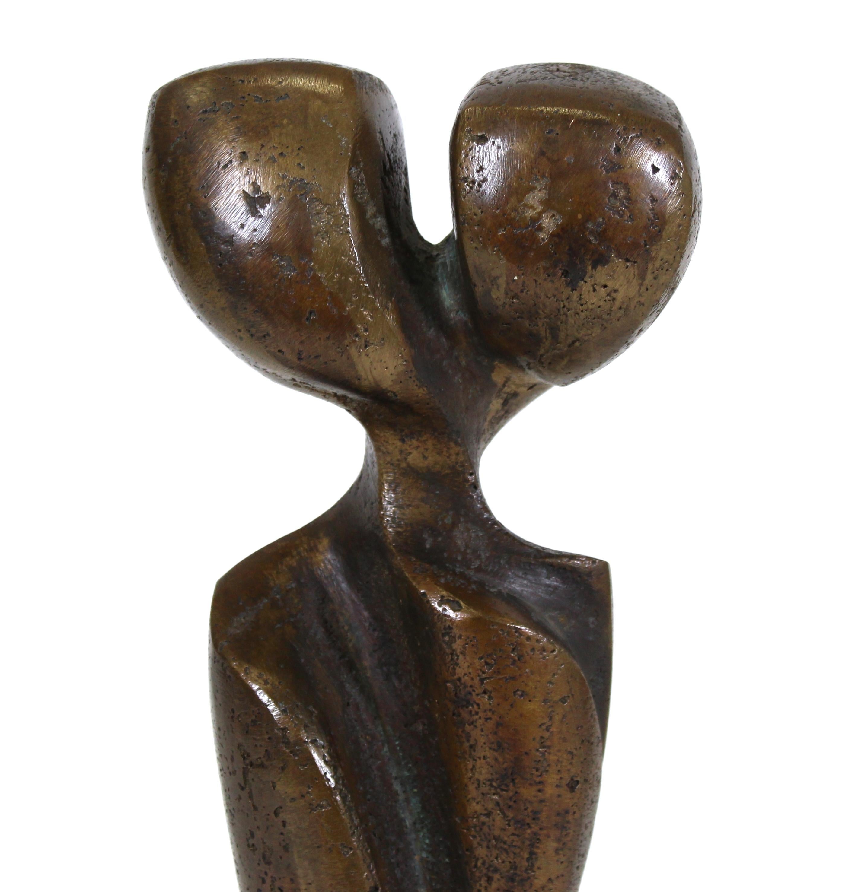 Cubist abstract modern cast bronze sculpture, marked and dated '79' near the base, mounted on ebonized wood base.