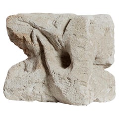 Cubist abstract sculpture in volcanic stone