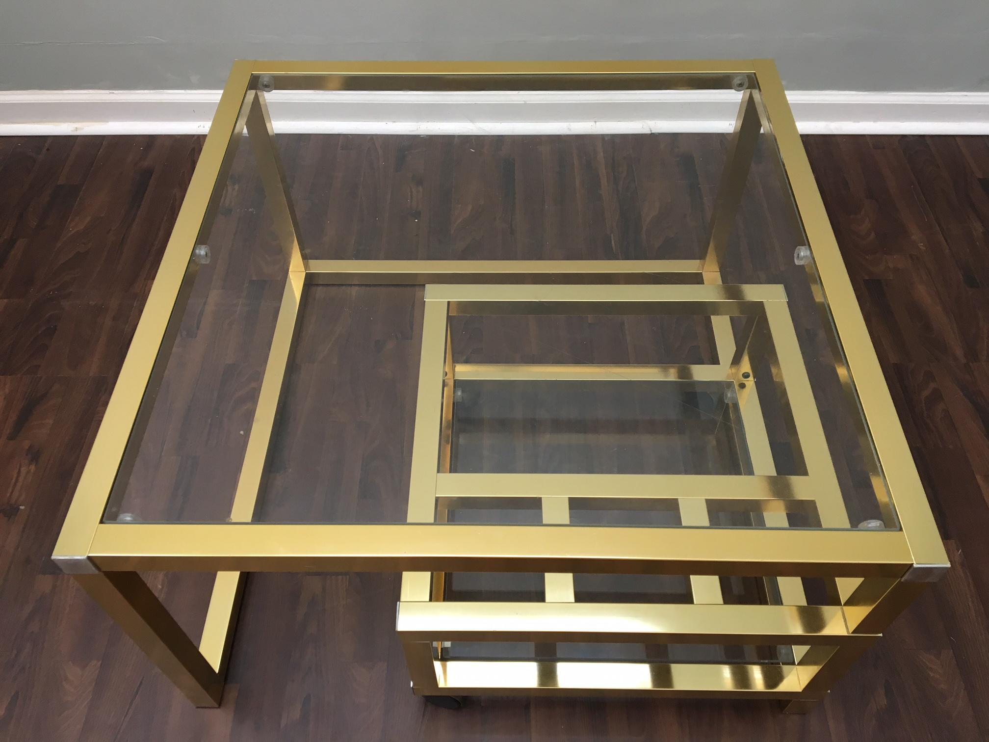 Hollywood Regency Cubist Brass Swivel Coffee Table with Wine Rack After Milo Baughman