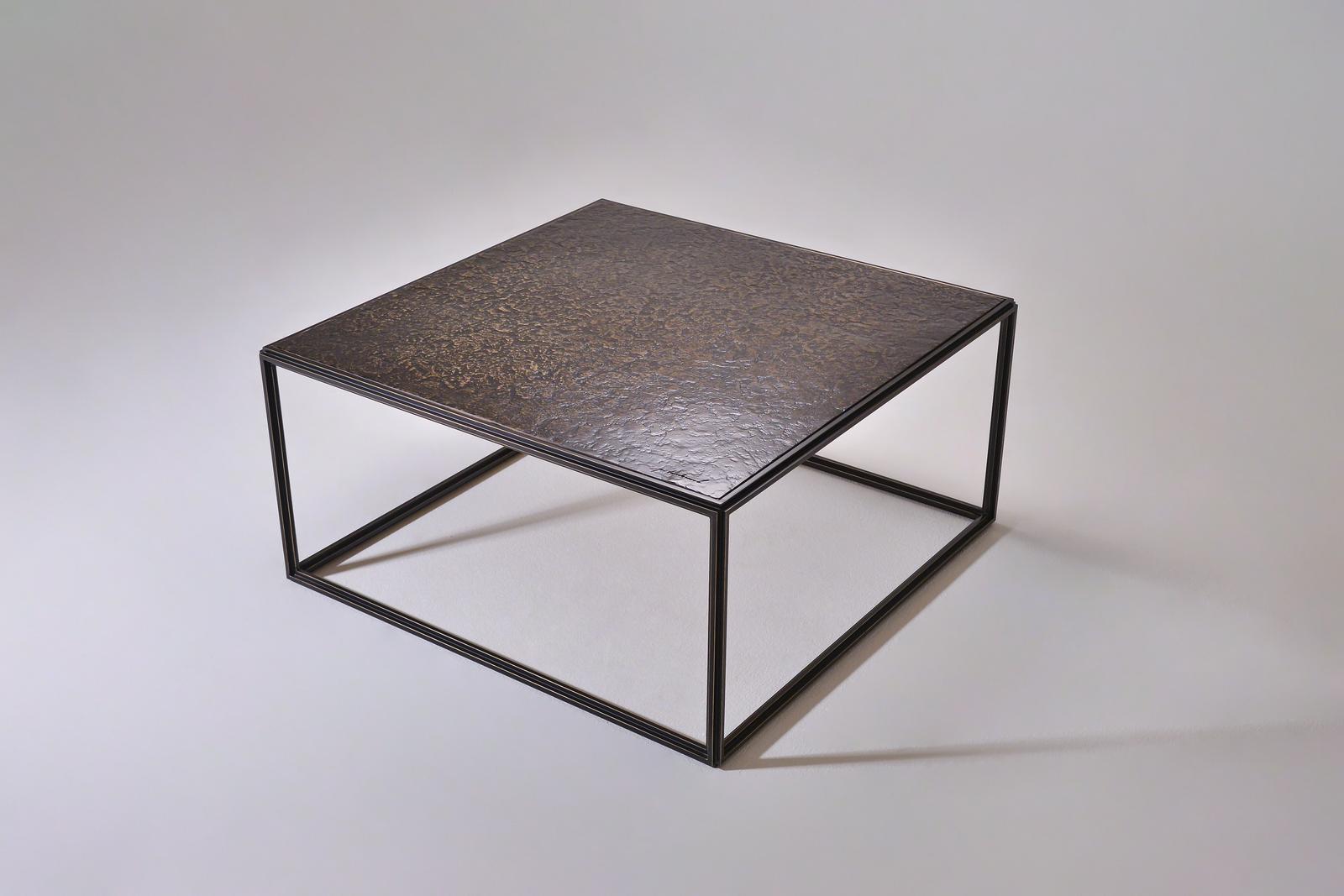 We love this play of contrasts in this version of our PT6 Bronze Low Table.

Inspired by the modernists we created this cubist table in extruded brushed brass and hand-welded profiles and topped it off with a sand-cast top in Textured bronze and to