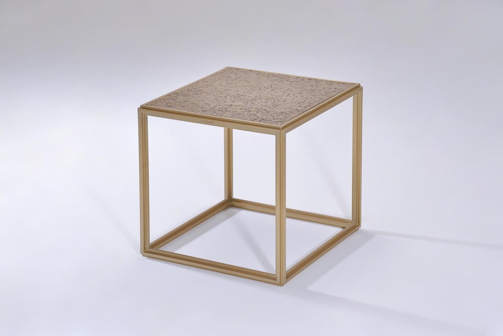 Inspired by the modernists we created this cubist table in extruded brushed brass and hand-welded profiles and topped it off with a sand-cast top in Textured bronze to add more contrast. This table was created for a designer in San Francisco as part