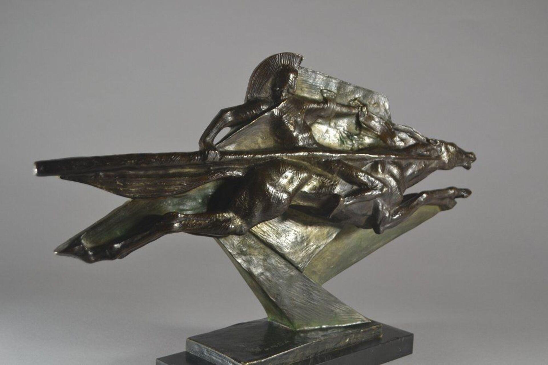 A stunning art deco modernist bronze sculpture of a warrior.
Signed 