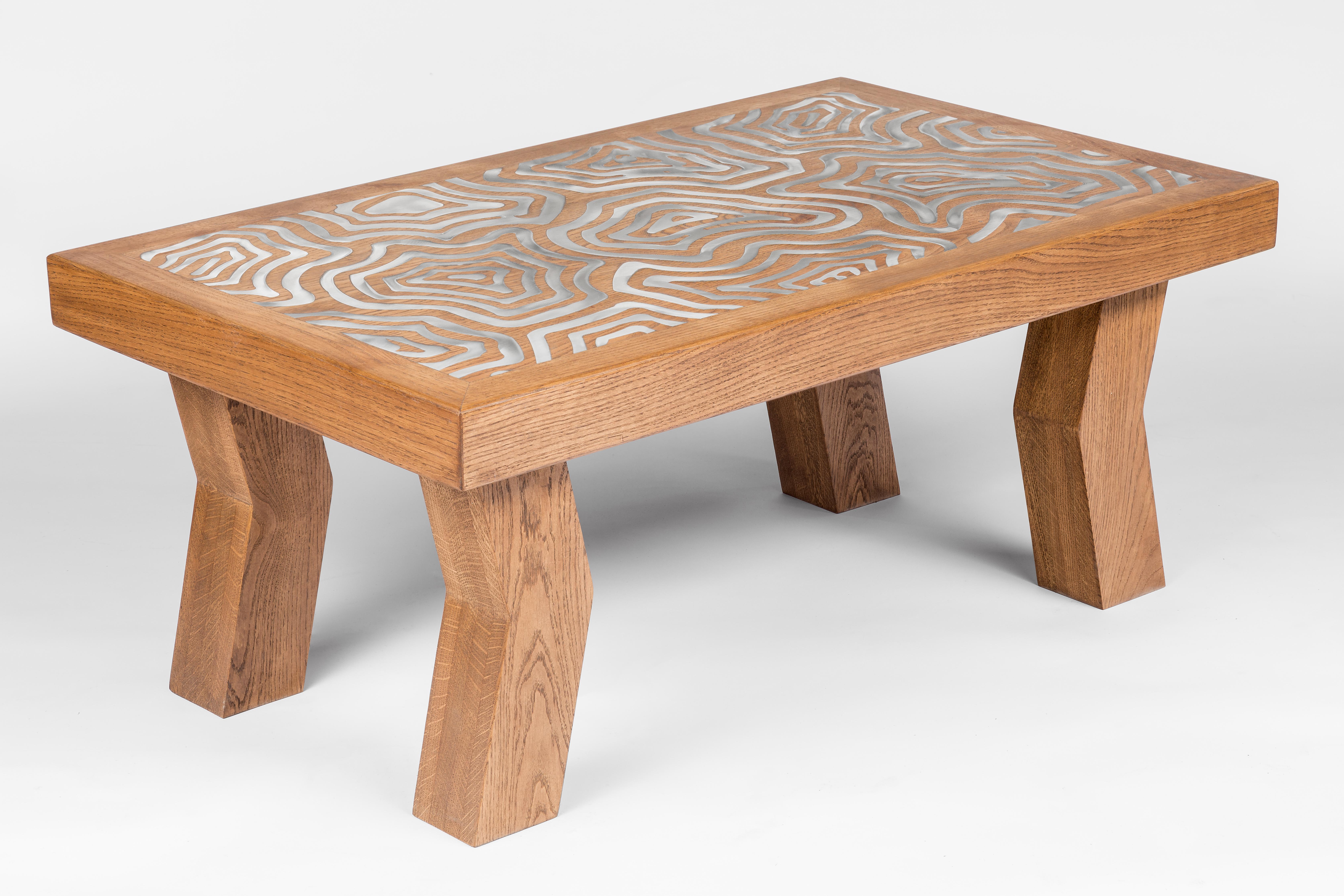 Cubist coffee table sculpted by Francesco Perini
Materials: Oak and steel
Dimensions: H 43 x W 101 x D 61 cm

Following a creative path that grew out of the founding of a company, I Vassalletti, known the world over for its extraordinary