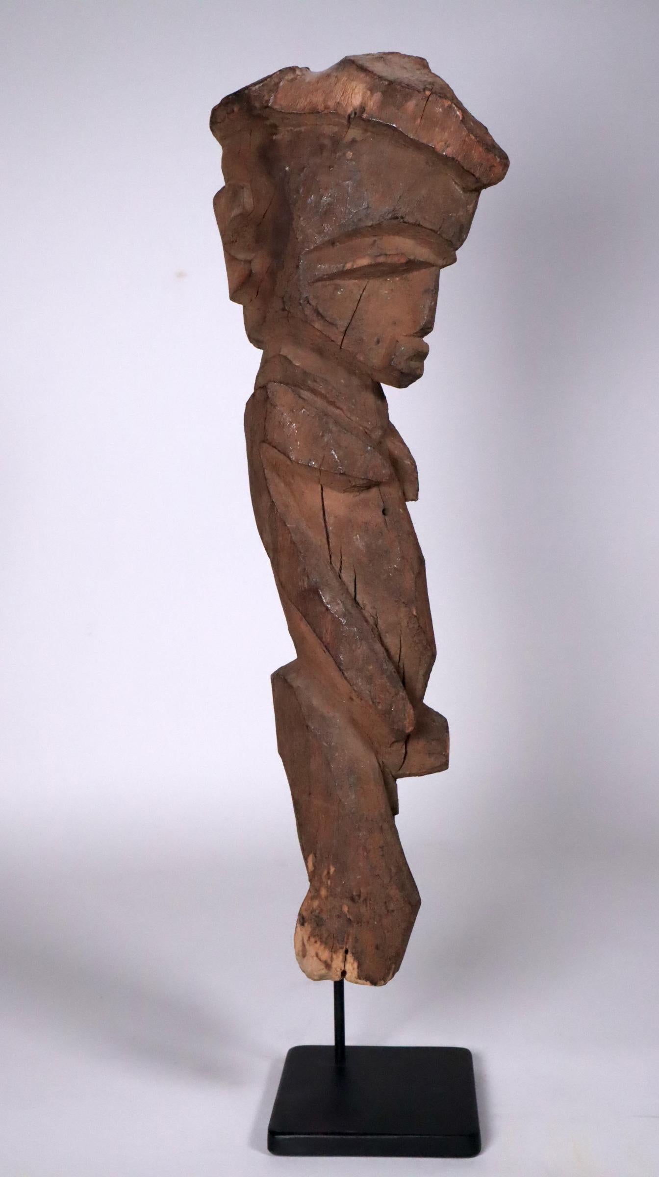Very cubist style Lobi carving composed of sharp angles and planes in an harmonious visual rhythm. The Lobi span a region of north Ghana, Burkina Faso, and a small part of the Ivory Coast. Figures such as this are carved for ancestral shrines or