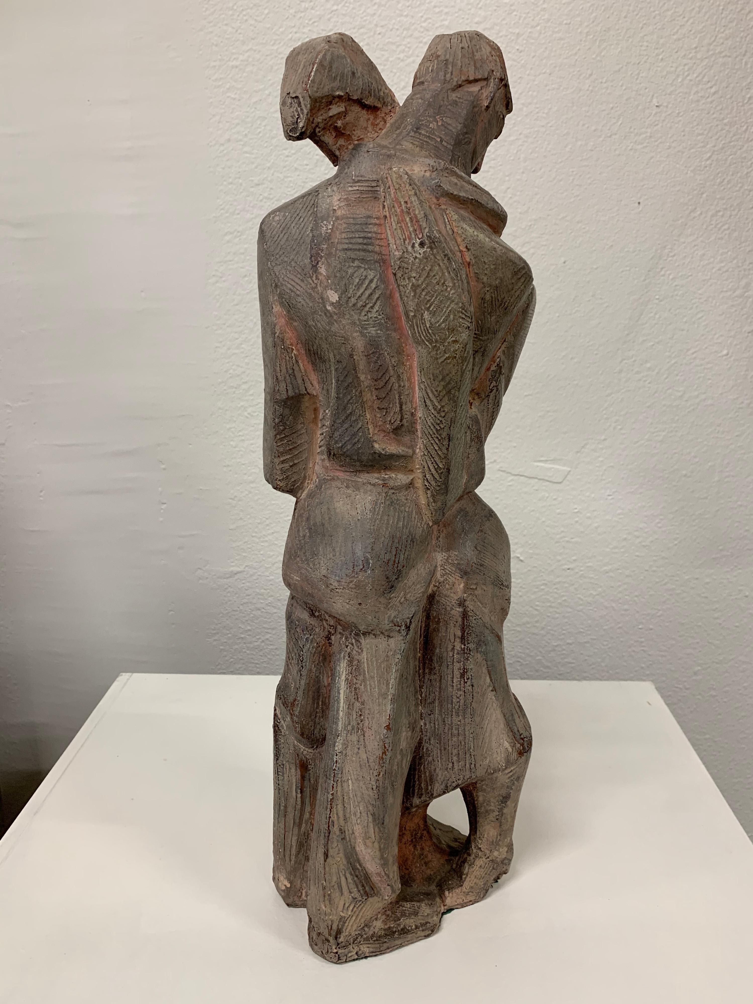 A wonderful terracotta sculpture by the noted American artist Albert Wein. He was a WPA artist and became an important California influence. It bears a paper label which is faded but reads; Albert Wein ??y Hill Lover. The rest is too worn to read.