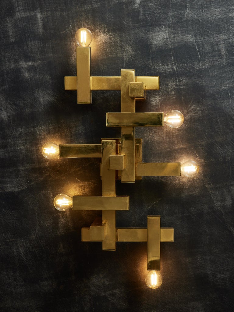 Cubist wall sconce by Gaetano Sciolari made of square tubes geometrically assembled from which come out six sources of light. Can also be attached to the ceiling as a flush mount.
Original maker sticker at the back.
 