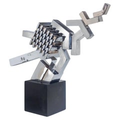 Escultura Cubista en Espejo Cromo Pulido