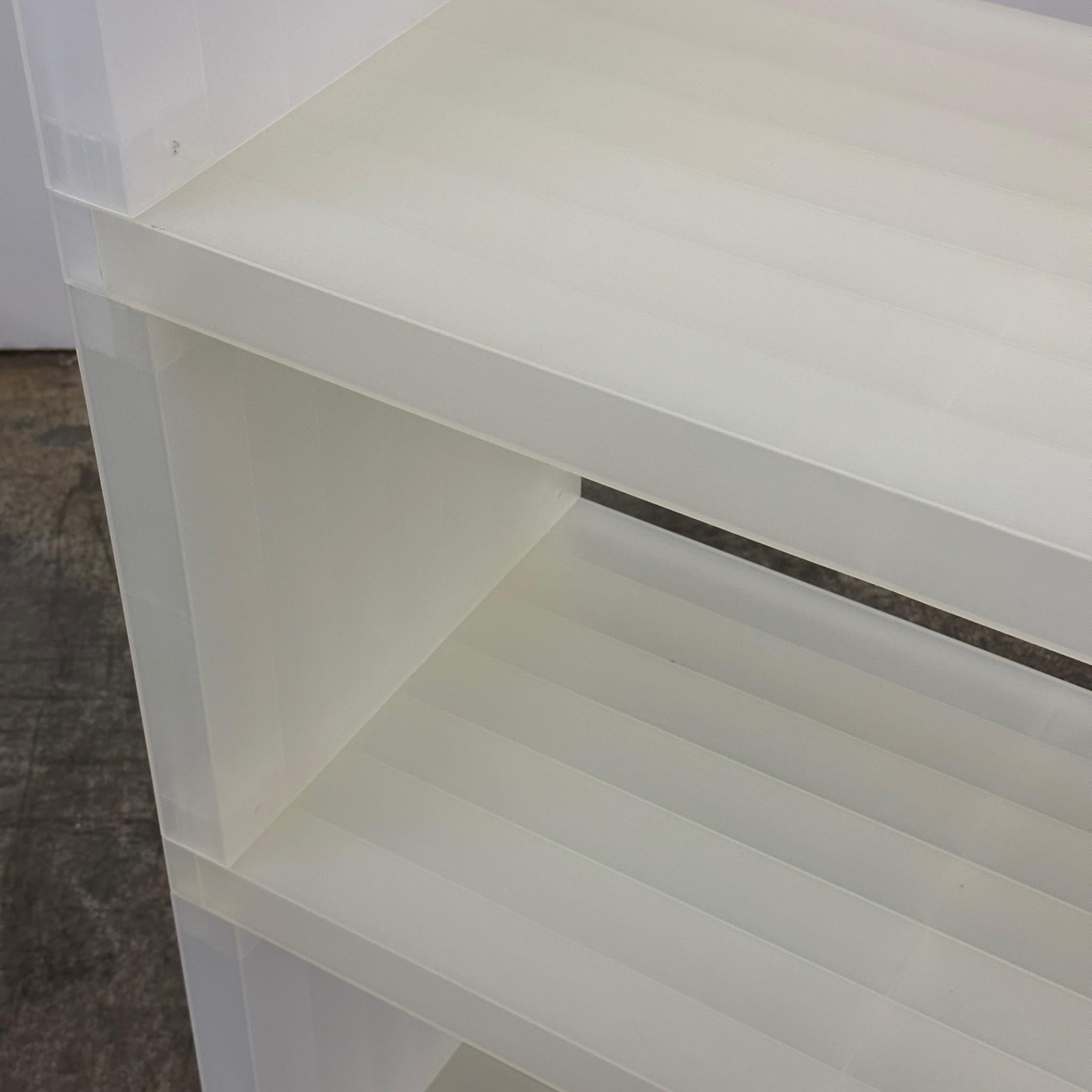 c. 2000s. In the style of the DWR cubitech shelving unit. clear plastic with modular connections so you can change shape.