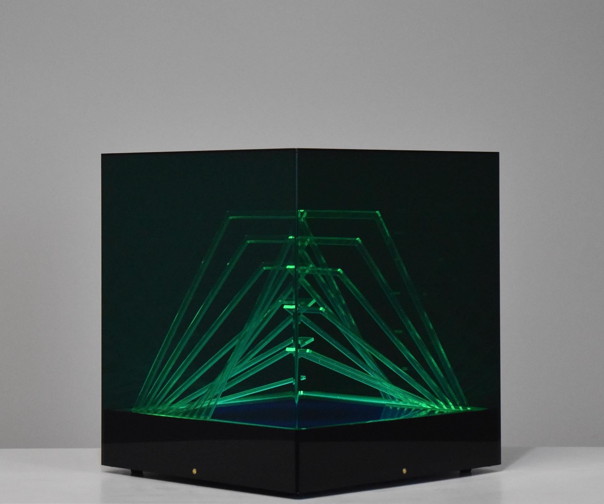 rare Iluminated sculpture named Cubo di Teo designed by James Rivière in 1970's and edited by Centro Ricerche di Arte Industria Lissone, Italy. Colored acrylic pieces and base with internal light.