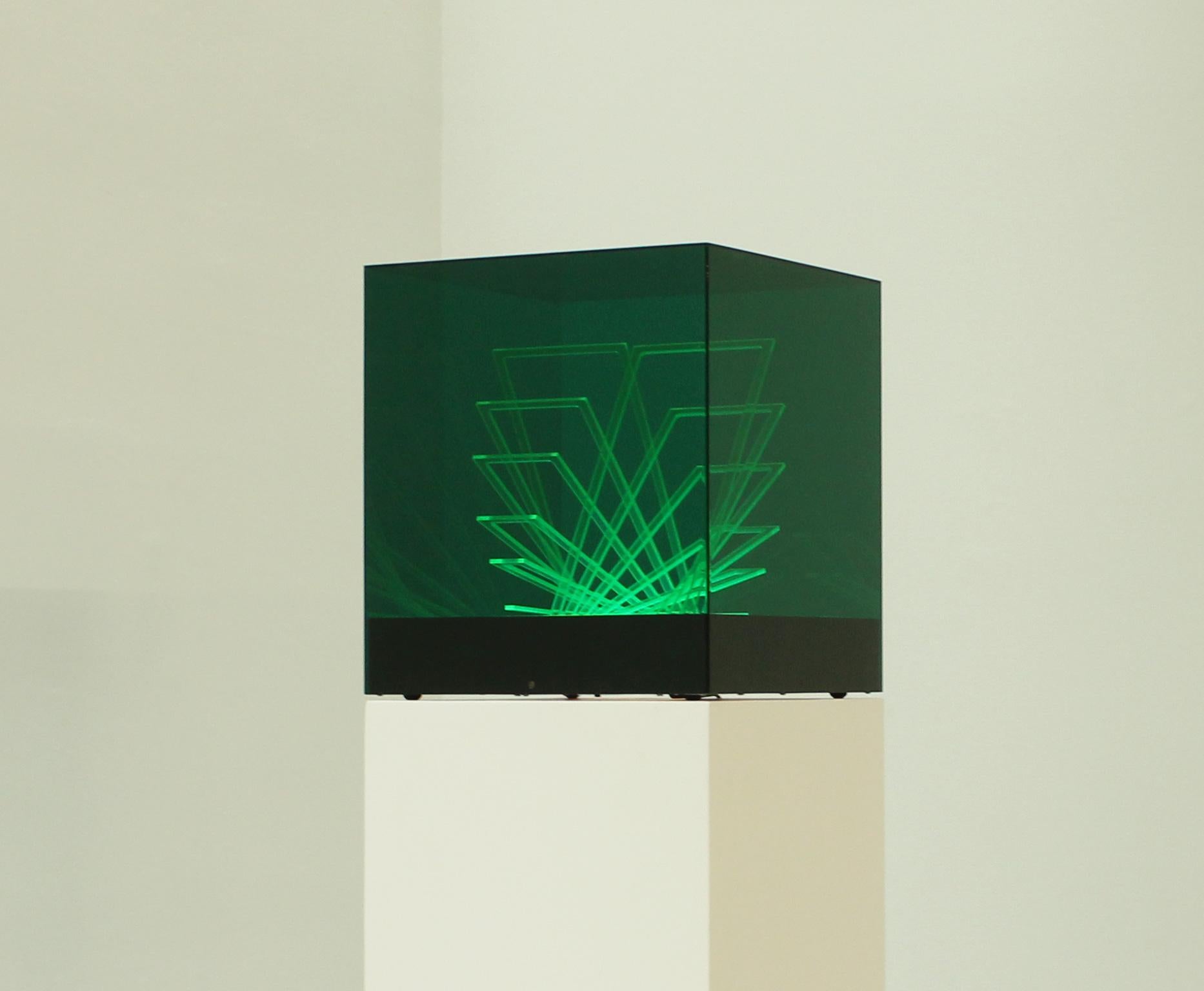 Iluminated sculpture named Cubo di Teo designed by James Rivière in 1970's and edited by Centro Ricerche di Arte Industria Lissone, Italy. Colored acrylic pieces and base with internal light.