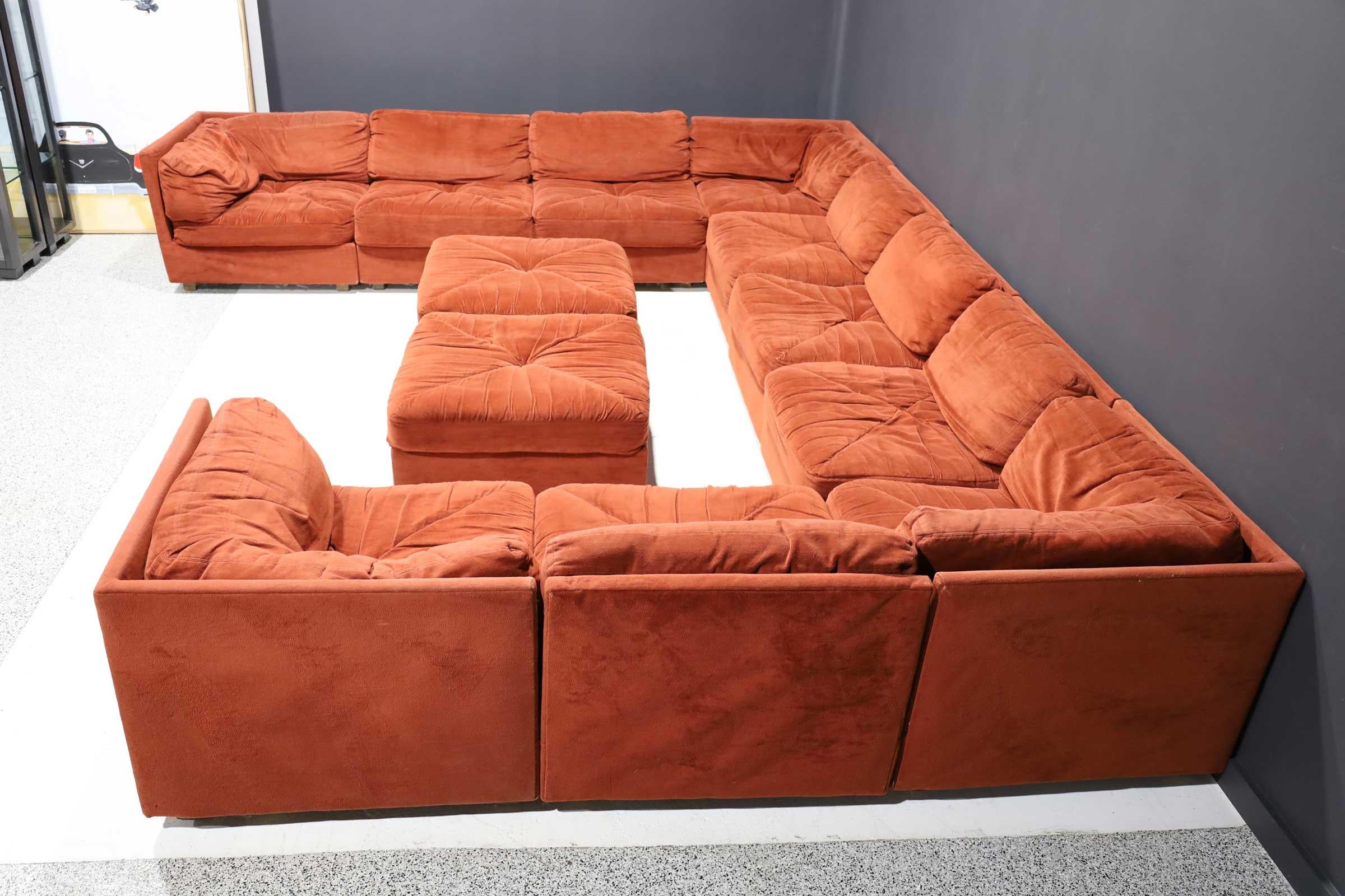 A fantastic 12 piece large cubo sofa by Selig. Can be arranged in multiple configurations. Each section is a 33