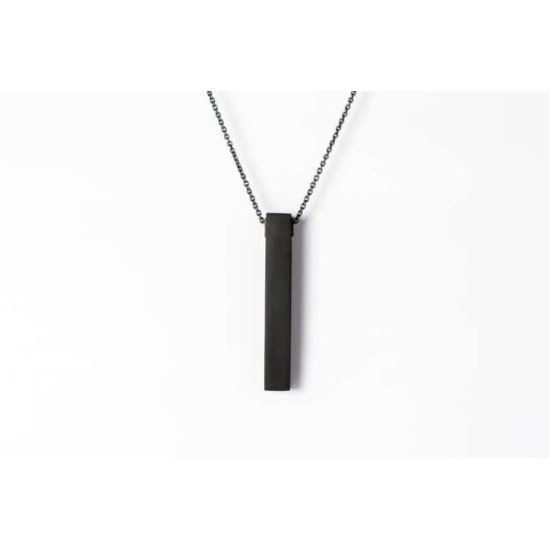 Pendant necklace in the shape of cuboid in JET, it comes on a 74cm sterling silver chain. This oxydized finish may fade over time, which can be considered an enhancement. Please note that Black Sterling tends to appear darker in photograph than in