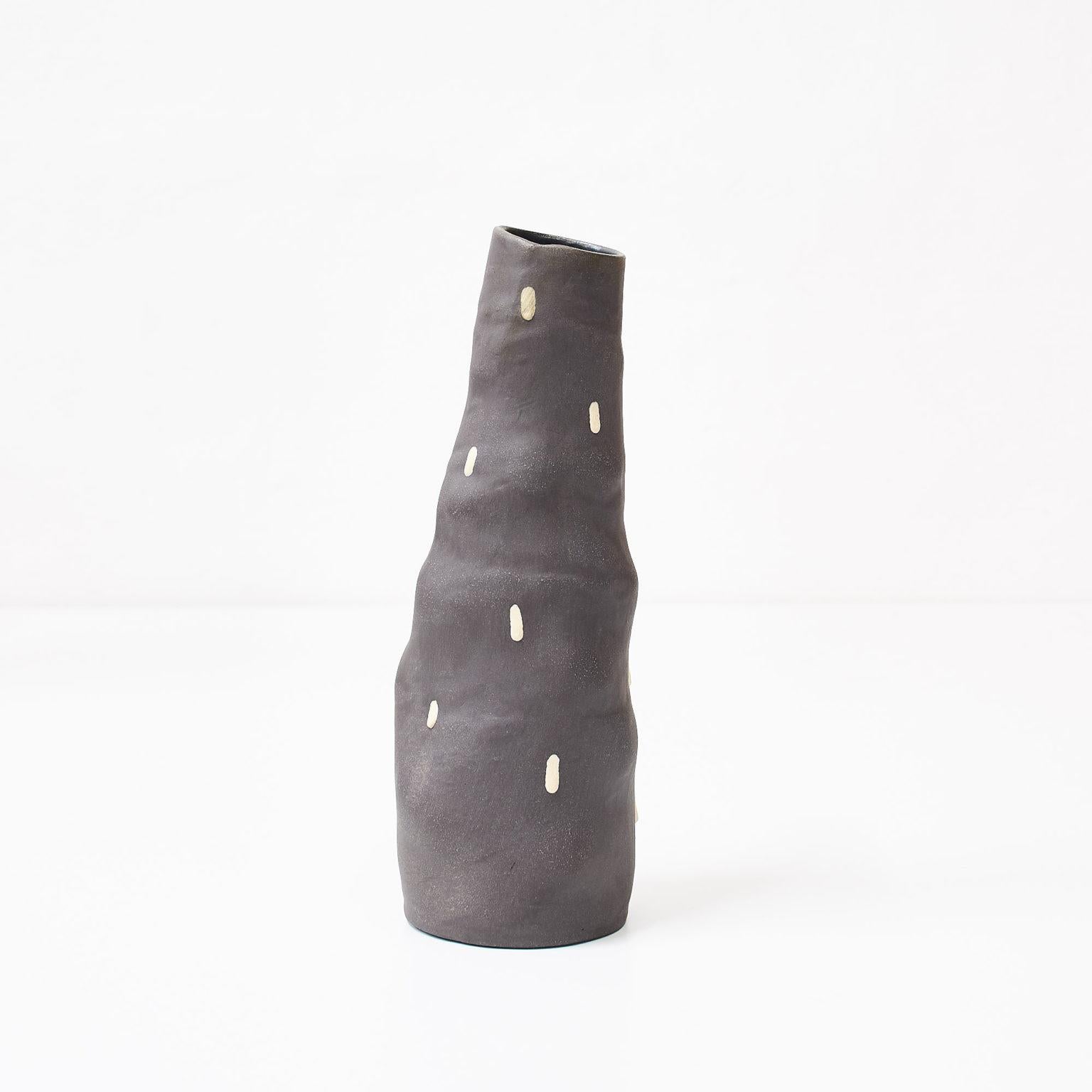 Cucumber vase by Siup Studio
Dimensions: D9 x H21cm
Materials: Ceramics

Siup is a small design studio based in Warsaw. The concept is created by three friends – Martyna Dymek, Marcin Sieczka and Kasia Skoczylas – who have met in University of