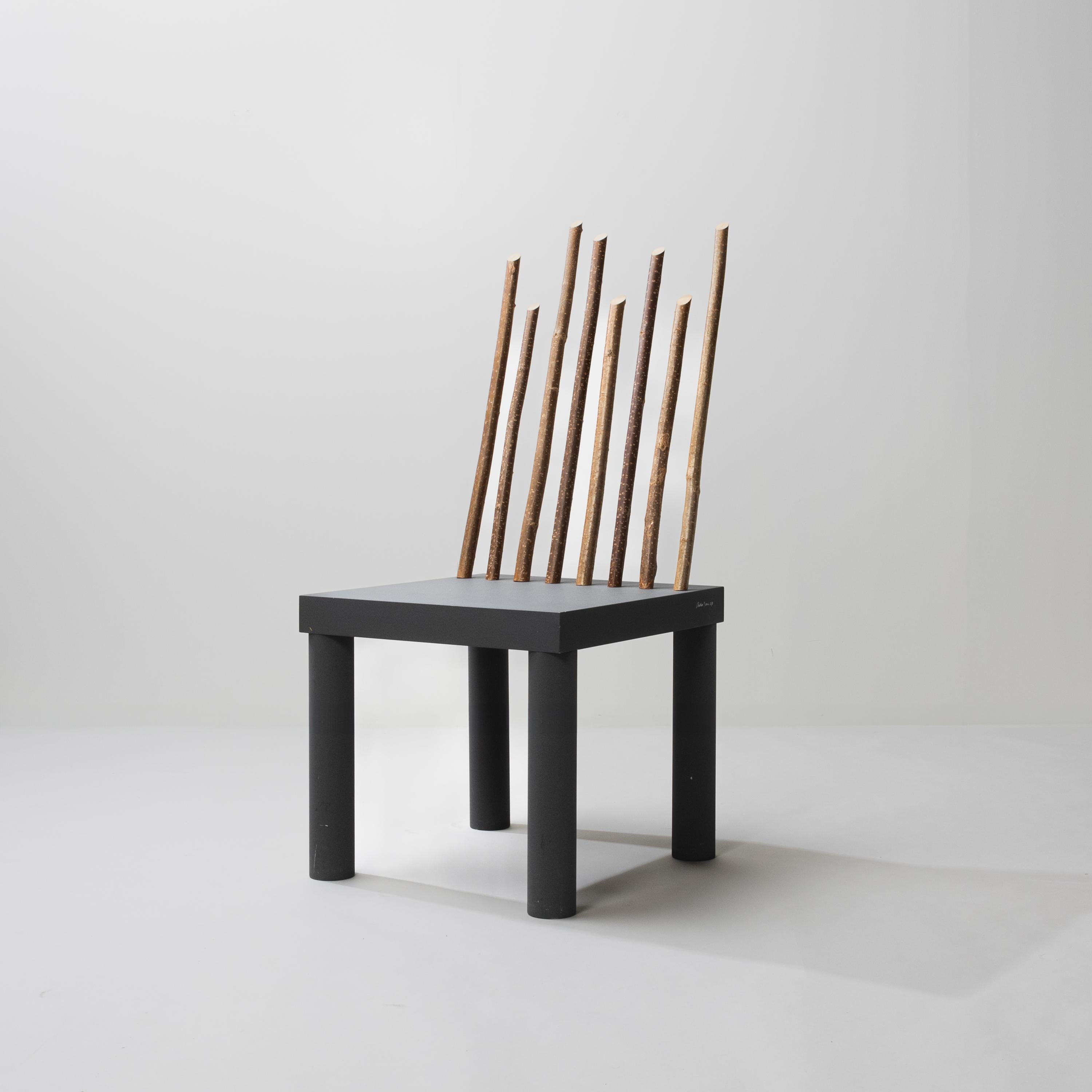 “Cucus”, chair from the “Domestic Animals” series by Andrea Branzi.
Chair in painted MDF (dark gray).
The backrest made of tree branches.
From a limited edition of 9 copies.
Our copy bearing number 2/9.

Andrea Branzi, one of Italy’s foremost