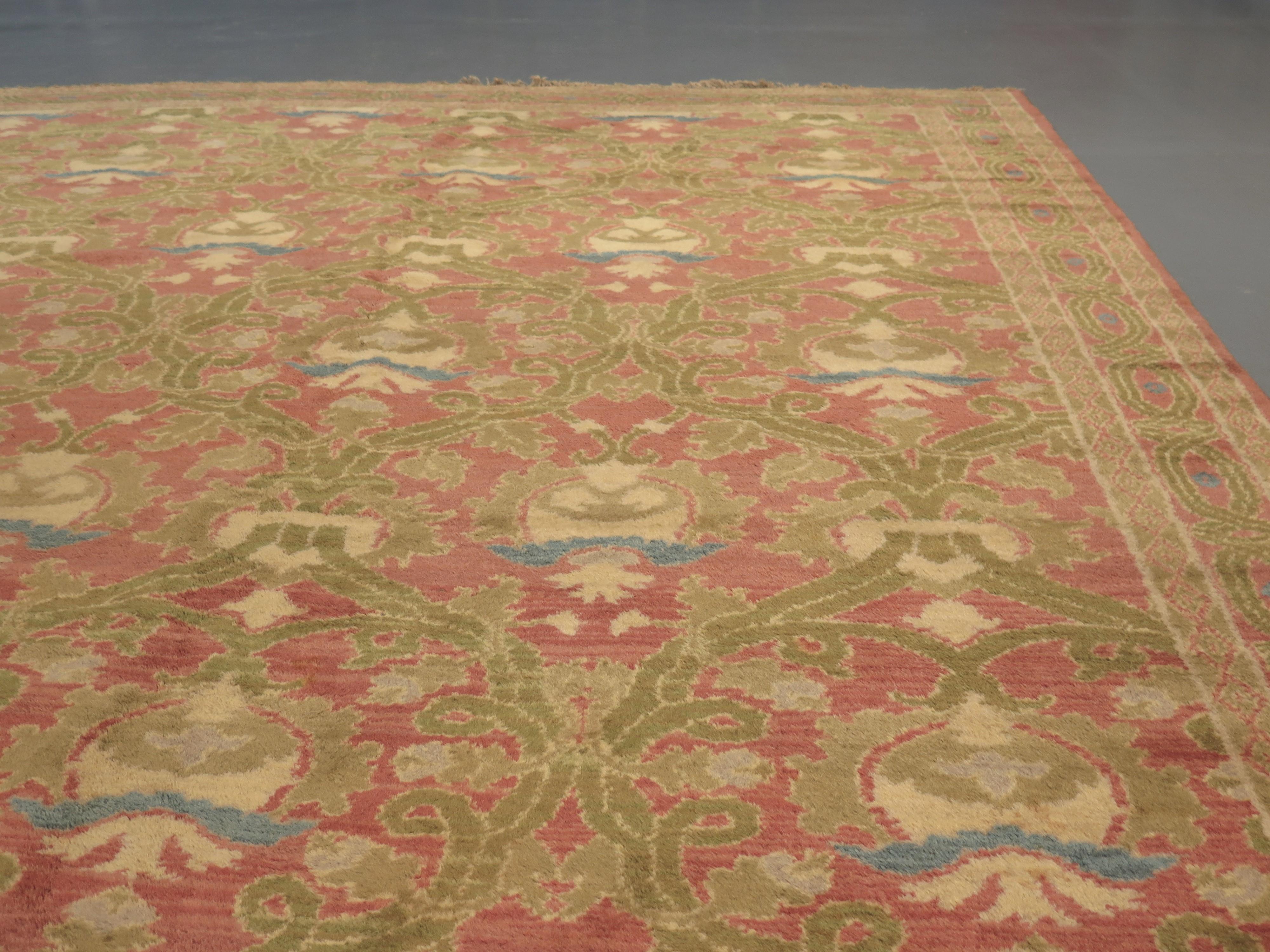 An attractive early 20th century Cuenca carpet which is influenced by the Arts and Crafts Movement which flourished in Europe and North America between 1880 and 1920.

This Cuenca carpet has a fresh array of vegetable-dyed colours with a