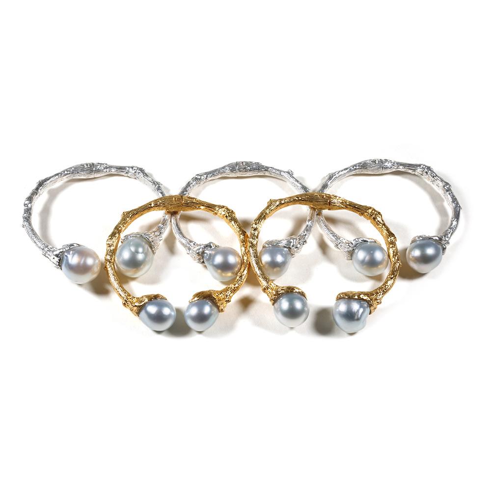 Channeling the eternal Tree of Life, the organic spirit of K. Brunini is captured through this large cuff in Sterling Silver artfully capped with 14mm+ South Sea Pearls. Because all pearls are unique, each cuff is a one-of-a-kind work or art. 

In