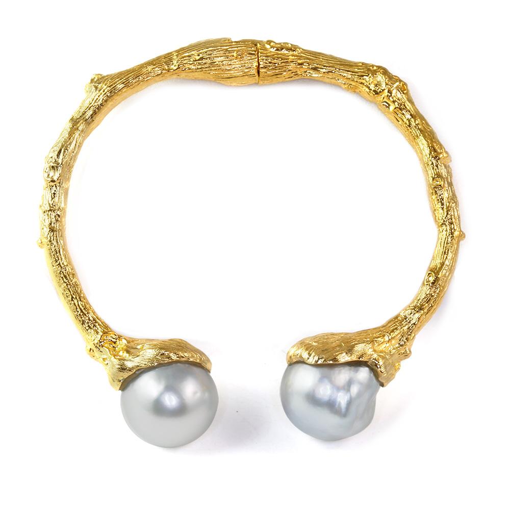 Channeling the eternal Tree of Life, the organic spirit of K. Brunini is captured through this cuff in 18k Yellow Gold artfully capped with 14mm+ South Sea Pearls. Because all pearls are different, each Cuff is a one-of-a-kind piece of art. 

In the