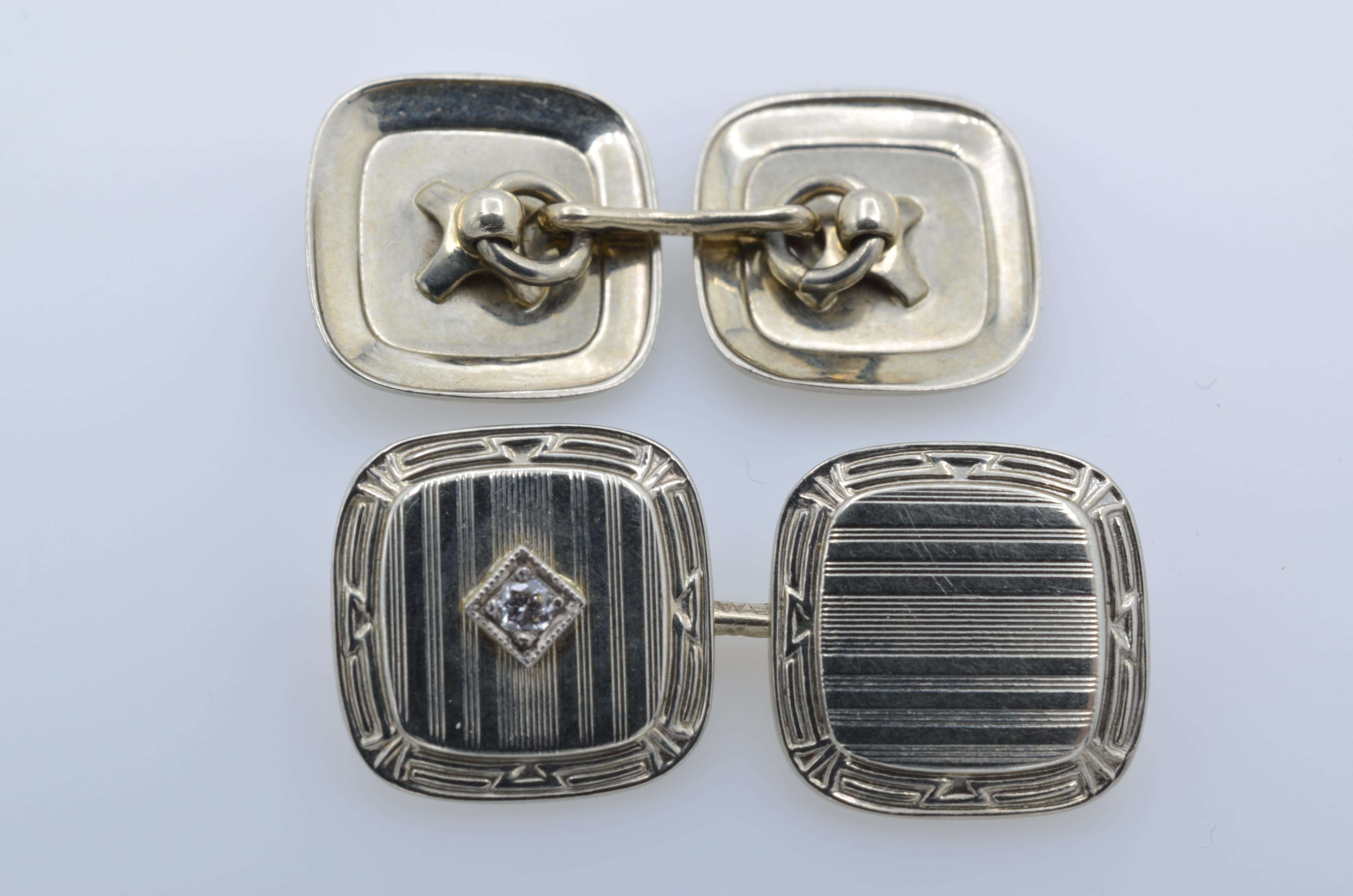 Superb and elegant these cuff links are the perfect gift for the discerning Gent.. The center diamond set in 14k adds a bit of sparkle and dazzle. The Roaring 1920's were an exciting renaissance. These are a tribute to that wonderful time.
