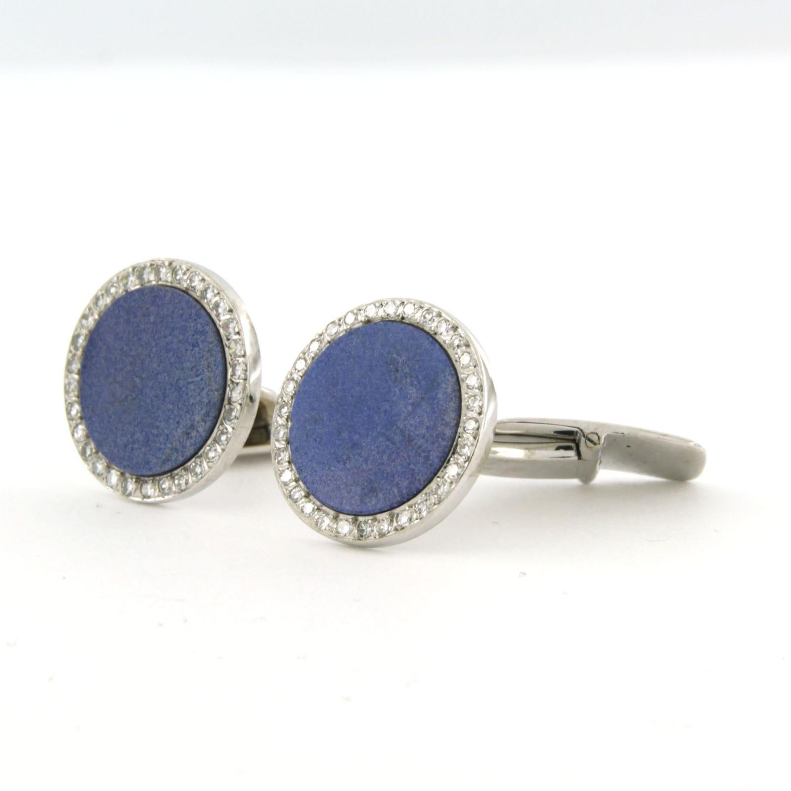 18k white gold cufflinks set with lapis lazuli and single cut diamonds. 0.54ct – F/G – VS/SI 

Detailed description:

The top of the button has a diameter of 1.7 cm wide 

Total weight 17.8 grams

set with

- 2 x 1.3 cm round flat cut lapis lazuli