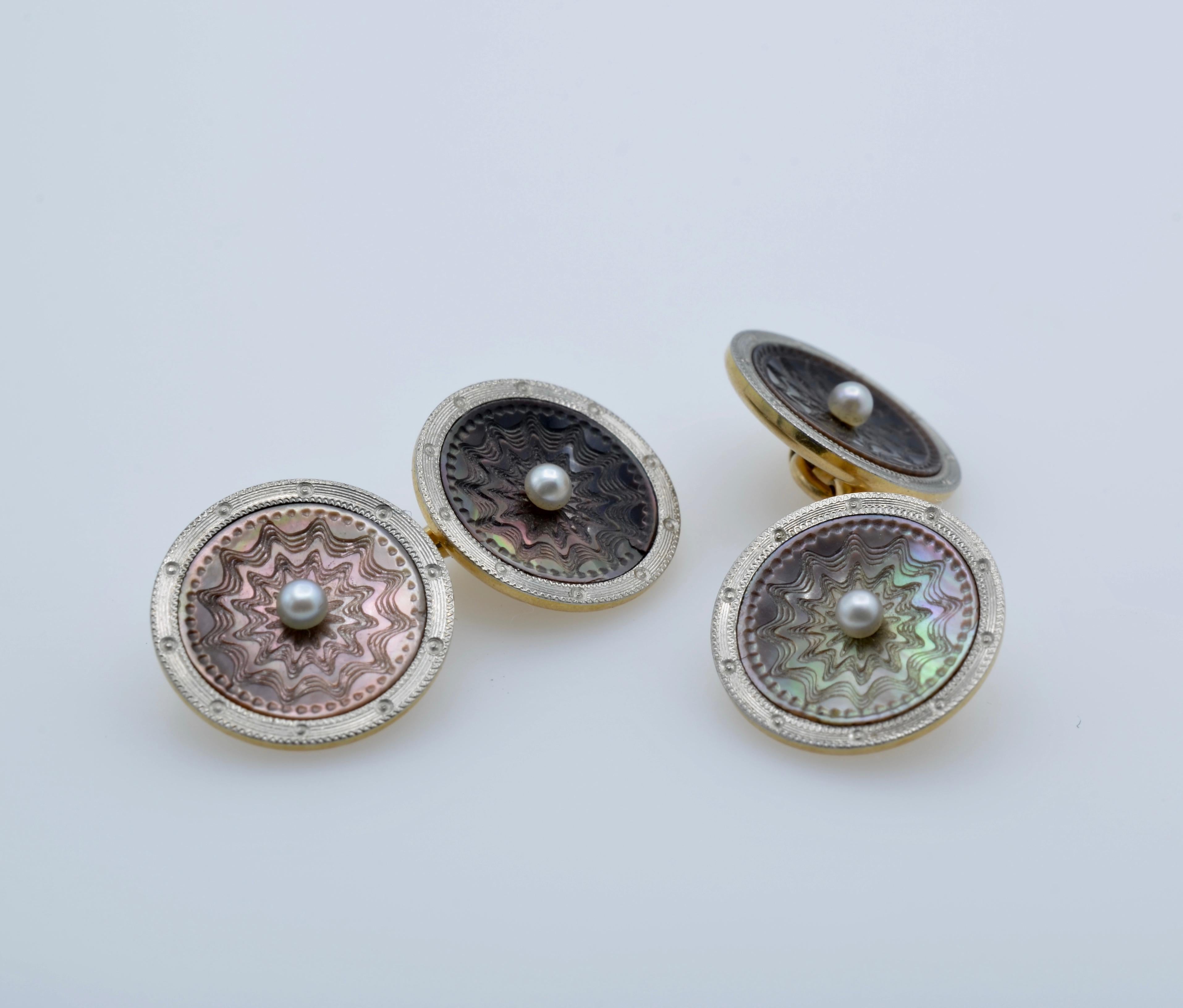 These stunning cuff links are perfect for a gent or a gal.They are feminine enough for the perfect ladies french cuff shirt. They are also stylish and masculine for a tailored man. The mother of pearl is delicately carved and accented by a dainty