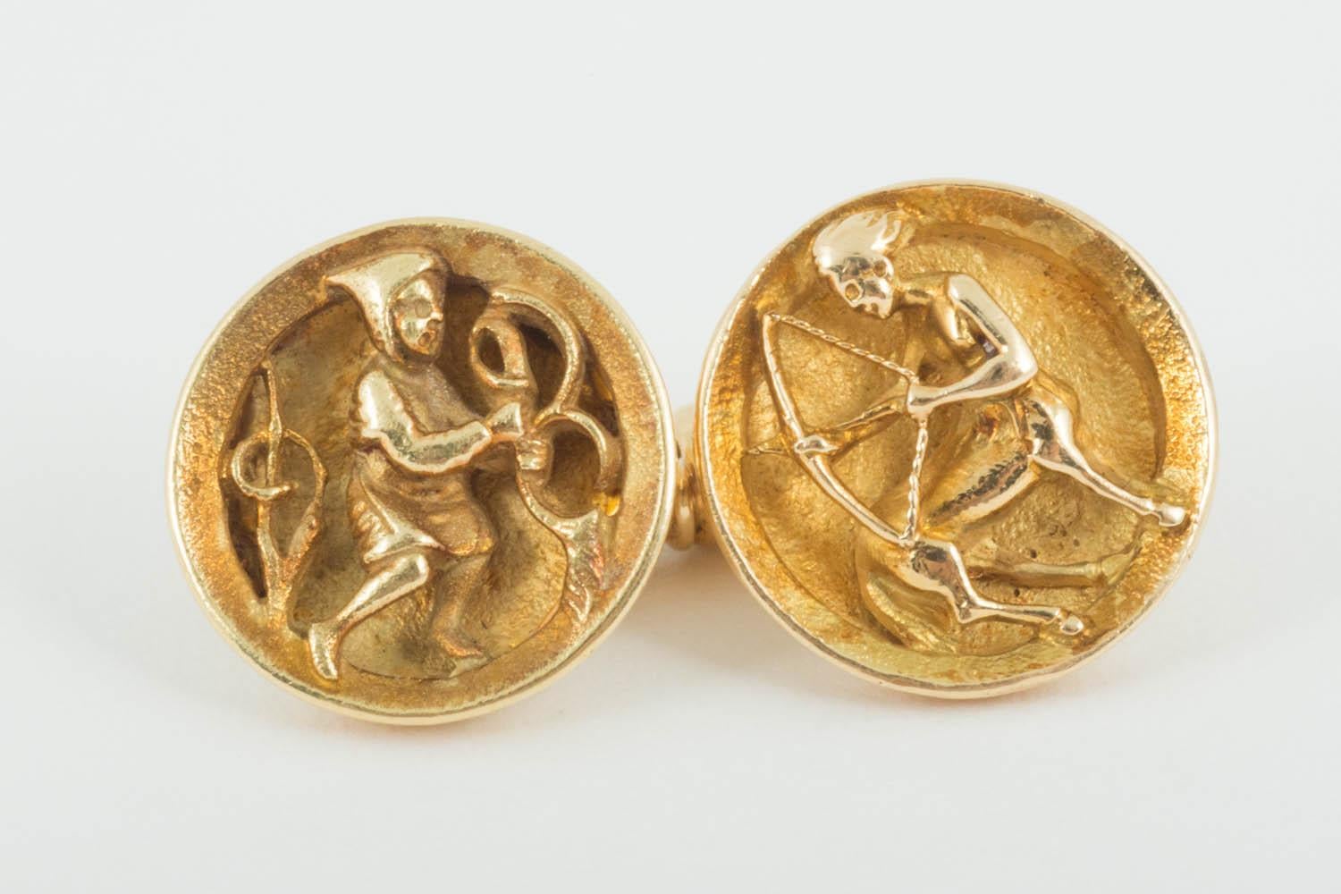 A finely made pair of 18 karat yellow gold cufflinks of concave form with Theological revival scenes including a centaur firing a bow and arrow.Signed in full with the makers lozenge of Wiese [Jules] Paris circa 1870.
Jules Wiese [1818-1890] was