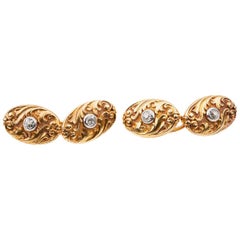 Carved Scrolled Cufflinks 18 Karat Gold 
Central Diamond, French circa 1890