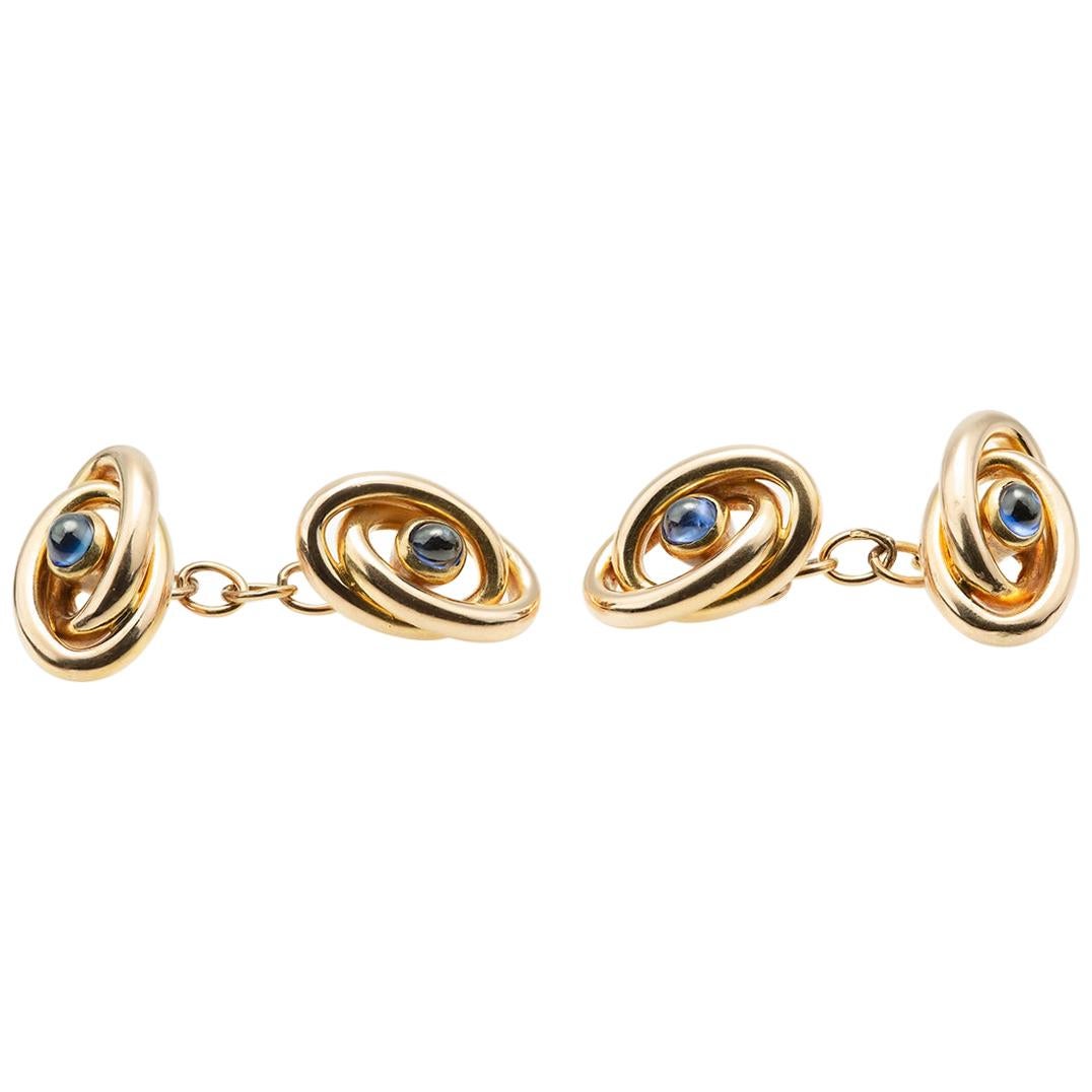 Cufflinks Antique French Gold Loops with Central Cabochon Sapphire, circa 1920 For Sale