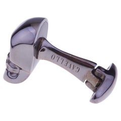 Boutons de manchette en or noir de Gavello représentant une tête de crâne et des rubis