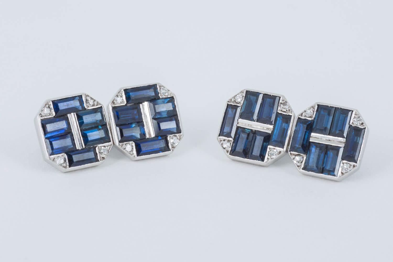 Pair of cut cornered square shaped Cufflinks by Cartier with two matching studs,set with six ,baguette cut sapphires,and four,brilliant cut diamonds,mounted in white gold and in original case.C 1930