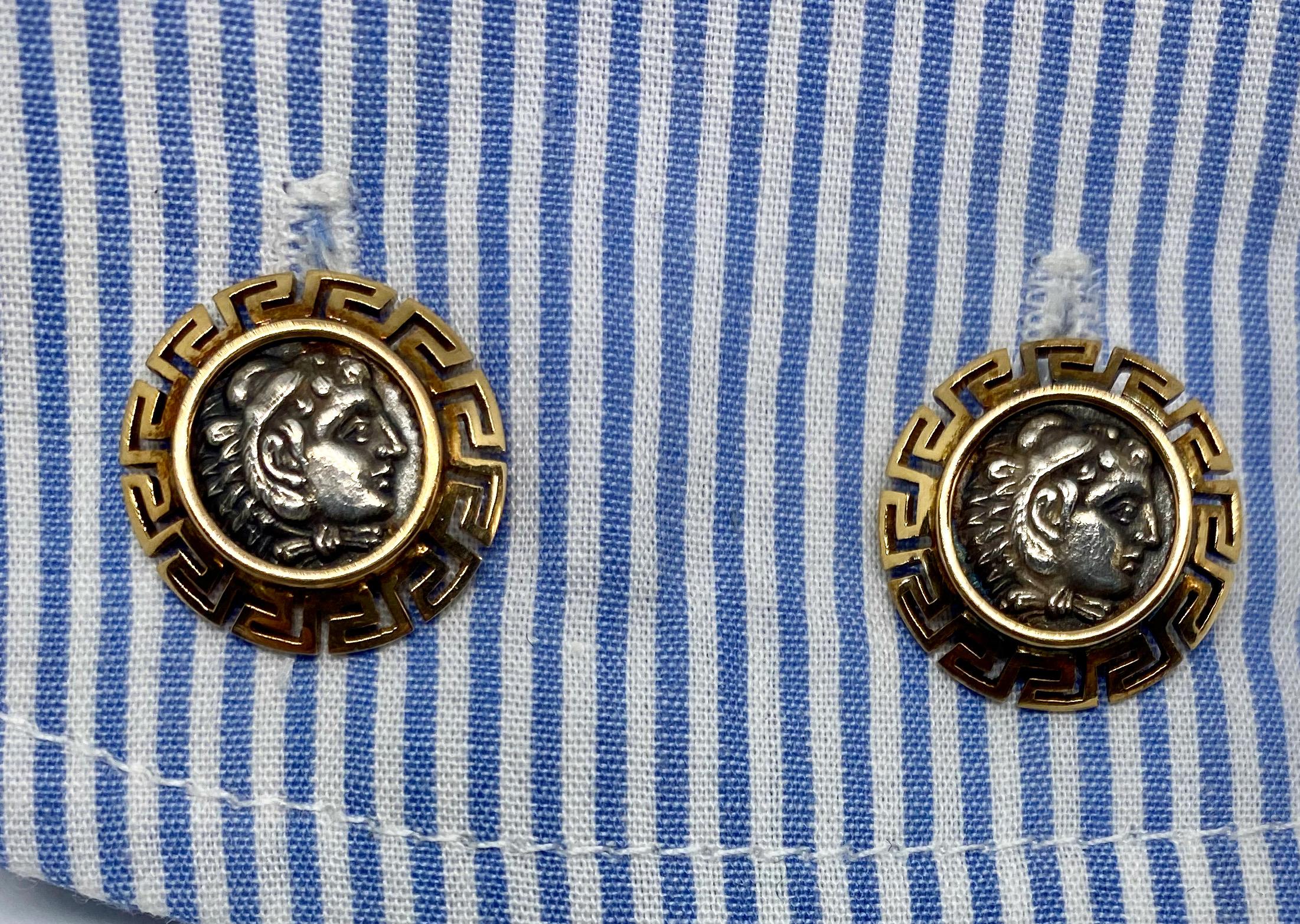 A pair of double-sided cufflinks centering on four silver coins featuring Alexander the Great set in solid 18K yellow gold 