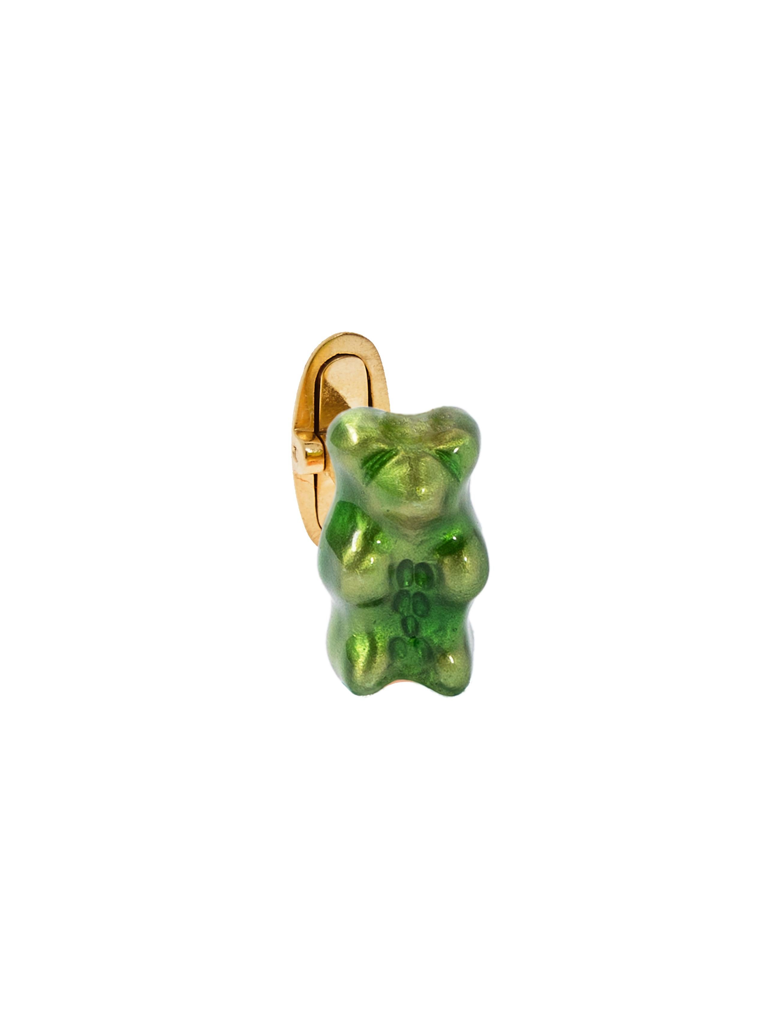 18K gold plated silver gummy bear cufflinks with transparent Green enamel coverage. 

The Gummy Project by Maggoosh is a capsule collection inspired by the designer's life in New York City and her passion for breakdancing and other street arts.