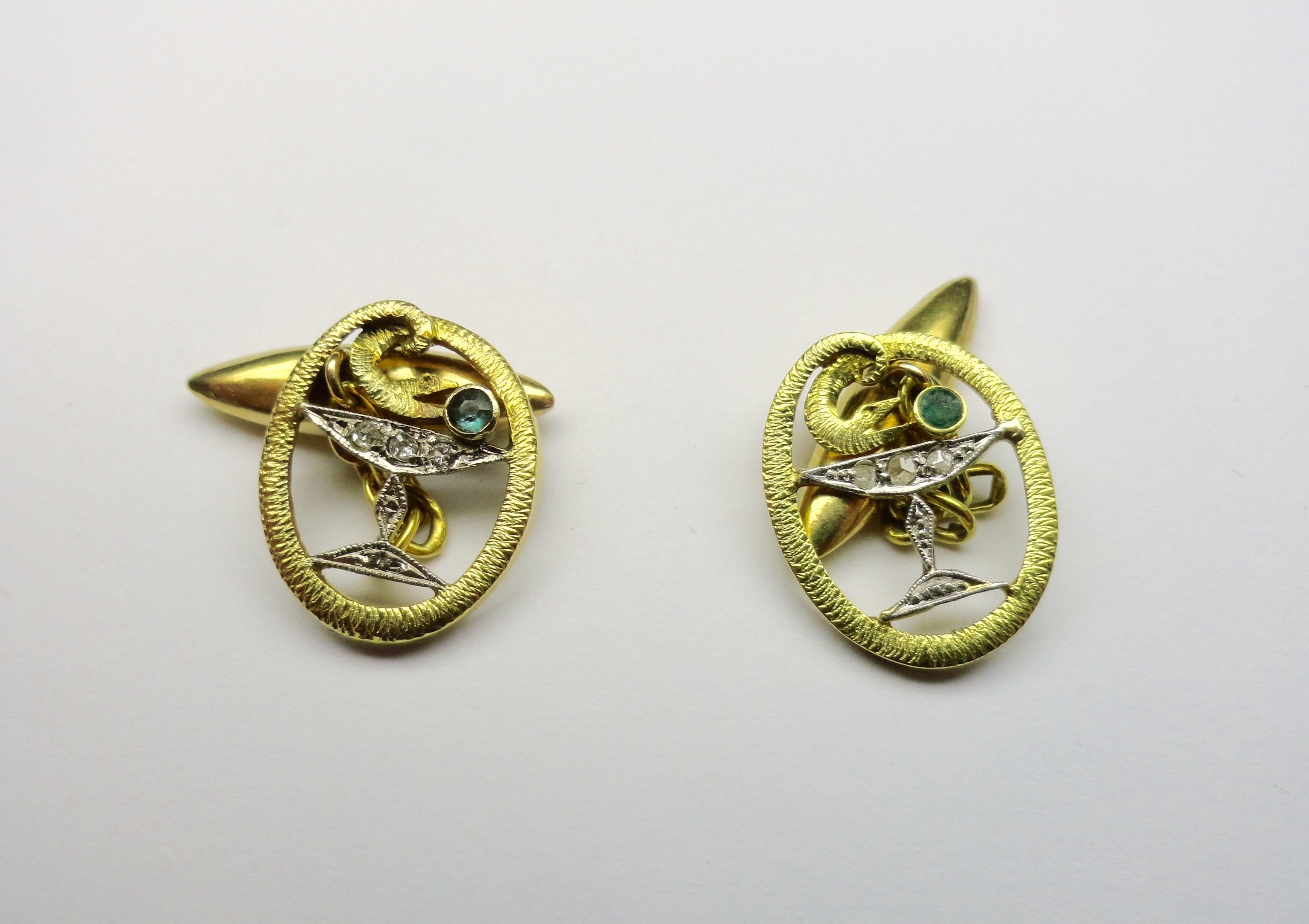 Cufflinks in 18KT gold with old cut diamonds and emeralds, with snake design from the 1930s.