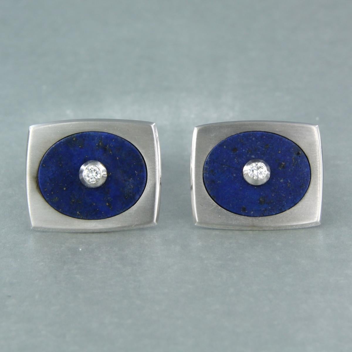 14 kt white gold cufflinks set with lapis lazuli ​​and brilliant cut diamond 0.06 ct F/G VS/SI - size 1.9 cm x 1.6 cm

detailed description

The cufflinks are 1.9 cm wide and 1.6 cm high

weight 11.7 grams

Set with

- 2 x 1.5 cm x 1.2 cm oval flat