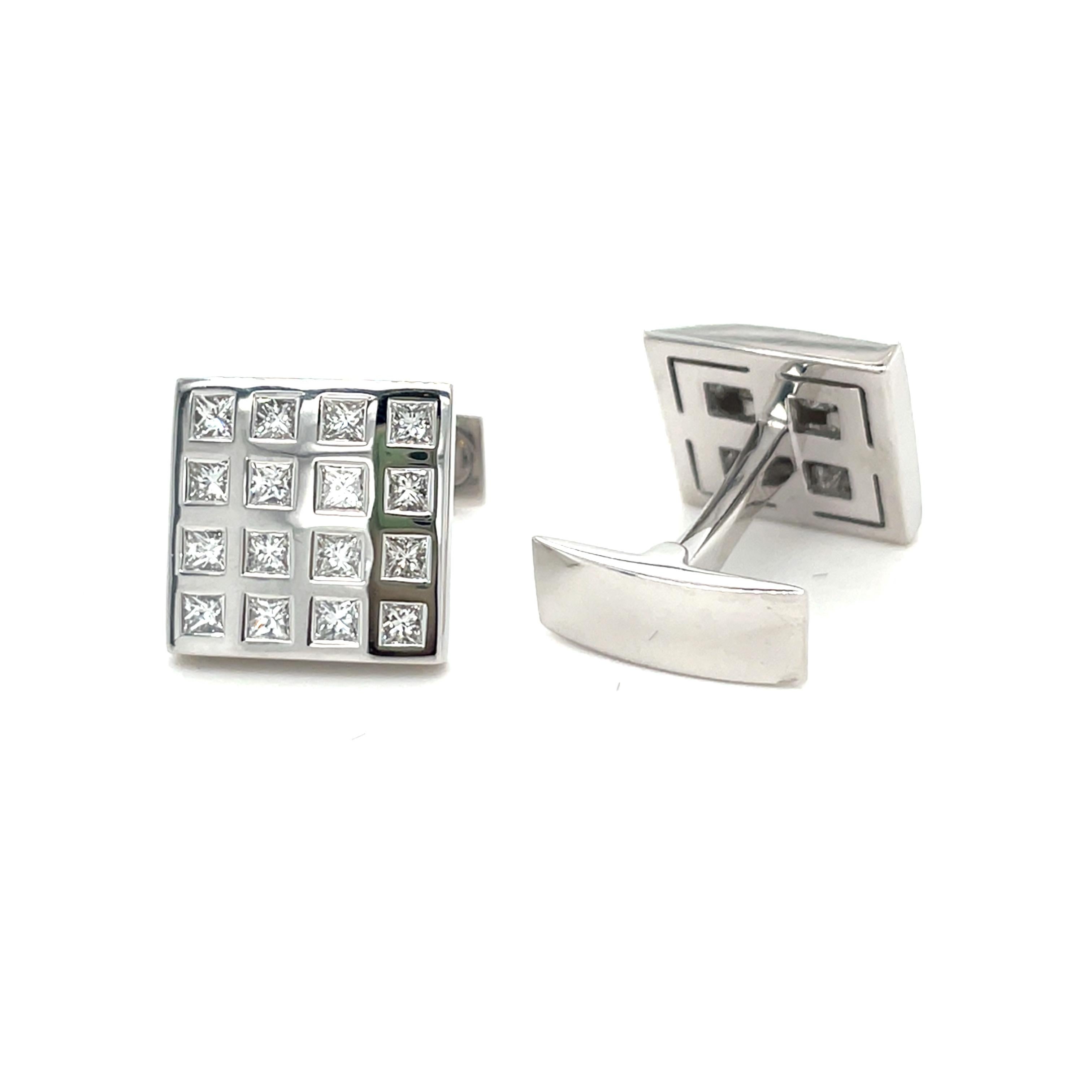 These white gold cufflinks are from Men's Collection. These cufflinks are decorated with White gold, 16 natural princess diamond G color VS clarity 1.94 ct. The dimensions of the cufflinks are 1.4cm x 1.4cm. These cufflinks are a perfect upgrade to