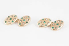 Cufflinks in 18 Karat Gold set with Emeralds and Diamonds, French circa 1900.