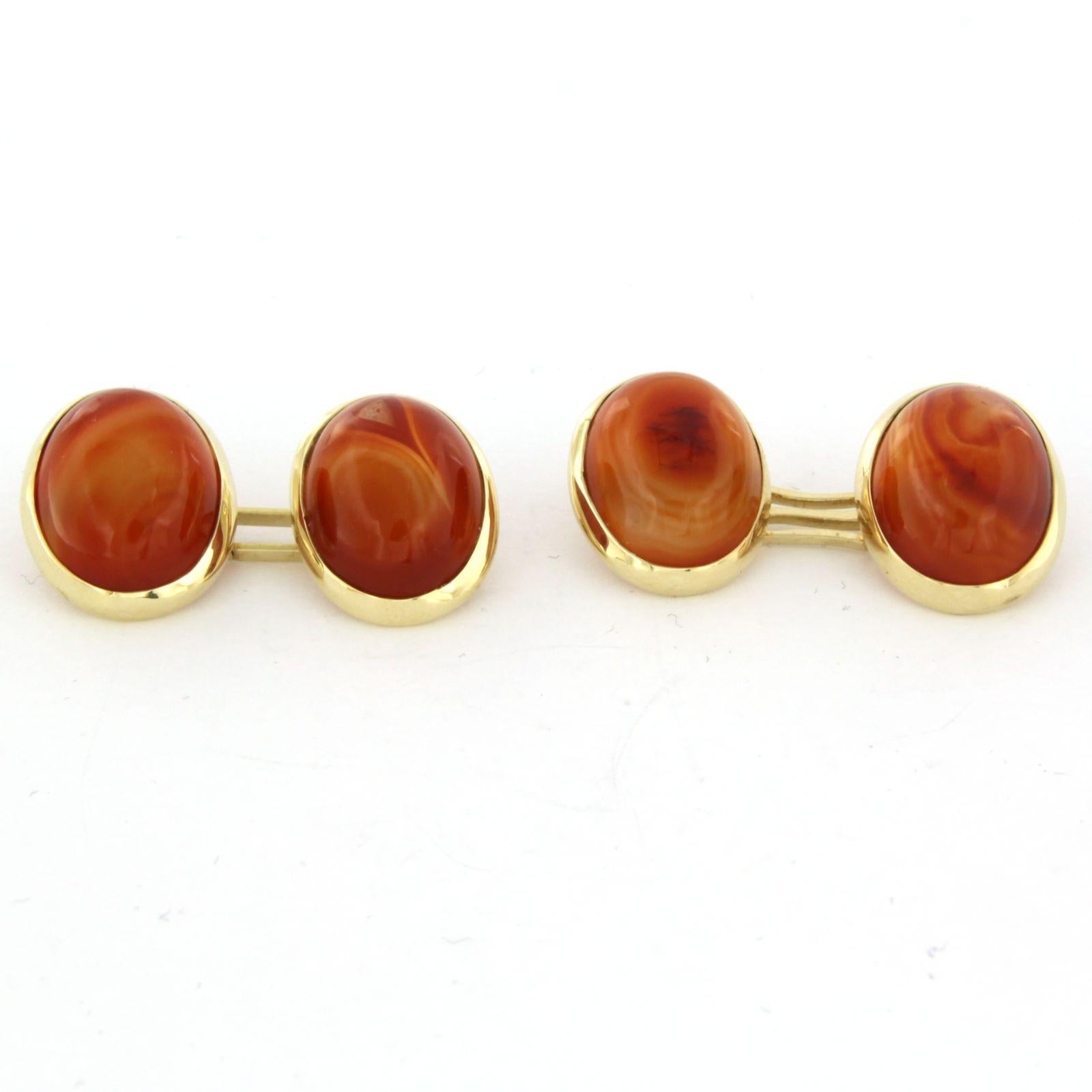 14 kt yellow gold cufflinks set with agate - size 1.7 cm x 1.4 cm

detailed description

The cufflinks are 1.7 cm wide and 1.4 cm high

weight 11.6 grams

Set with

- 2 x 1.5 cm x 1.1 cm oval cabochon cut agate

color red and yellow
clarity