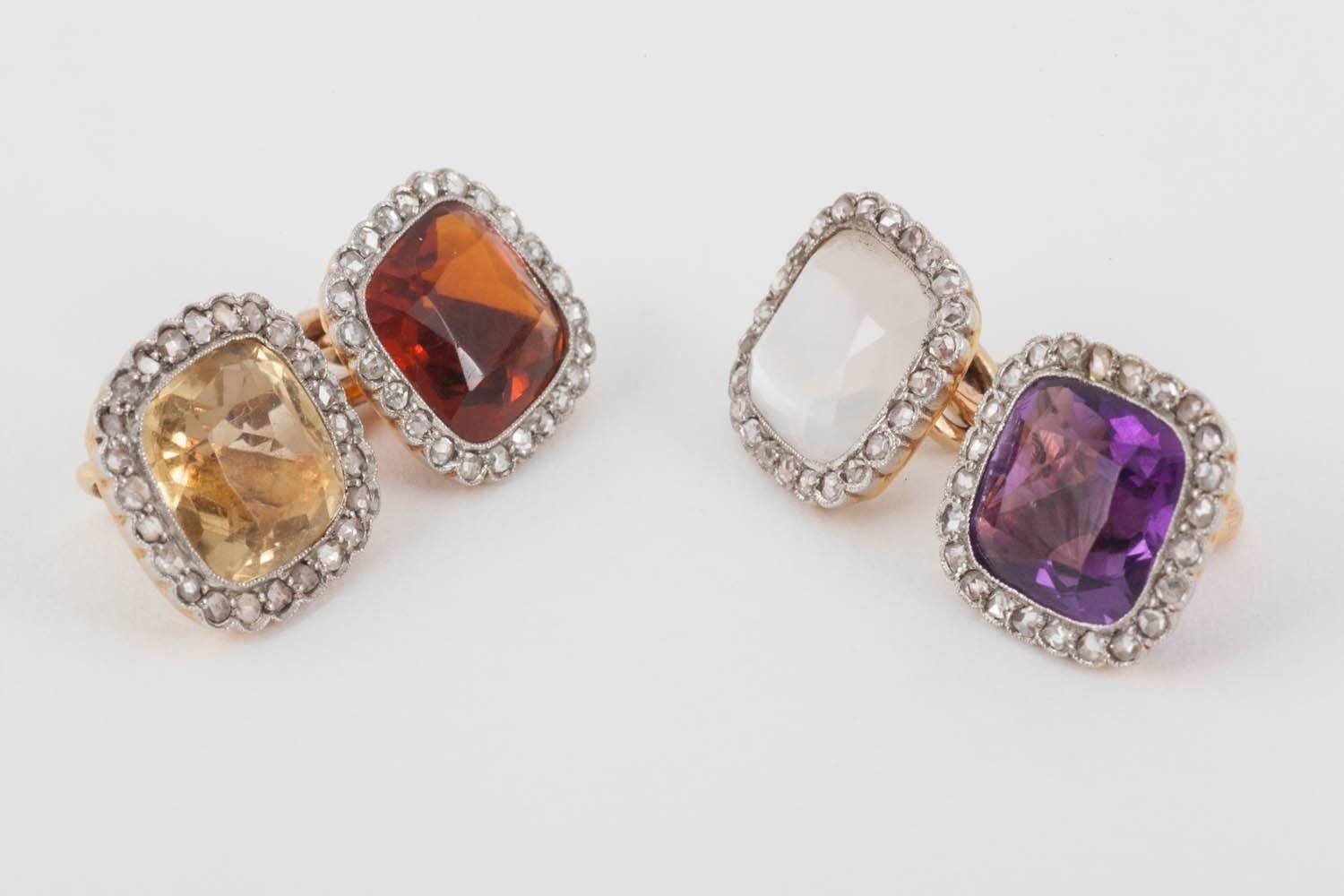 Pair of rose cut diamond cluster cufflinks,with a frosted Crystal ,Amethyst,Citrine,and a Quartz topaz Centre.The figure of eight ,link connection opens ,in order to change the colours.Very bright quality stones.Probably  Austrian,set in