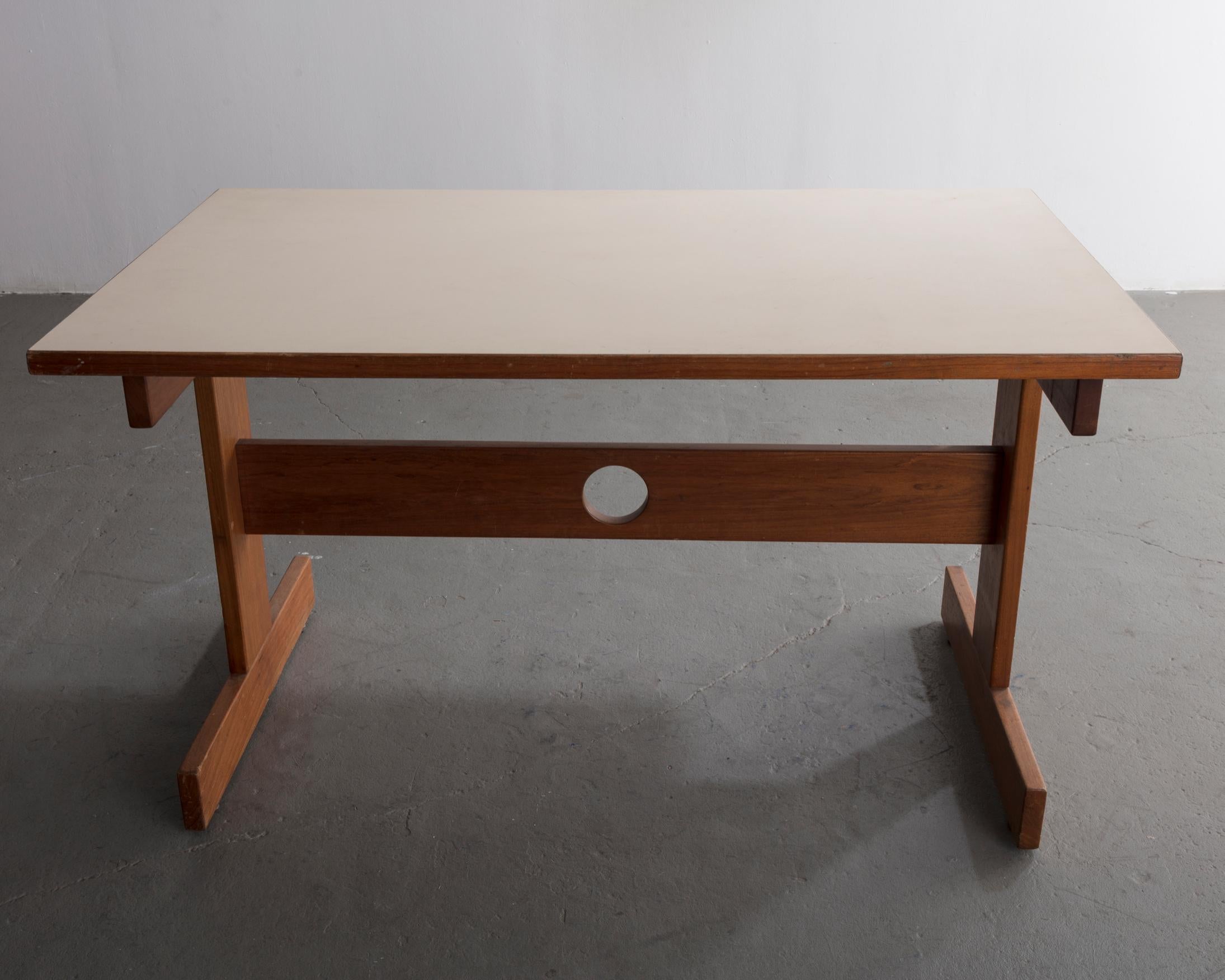 Dining table from the Cuiabá series in caviona wood with formica top. Designed by Sergio Rodrigues, Brazil, 1985.