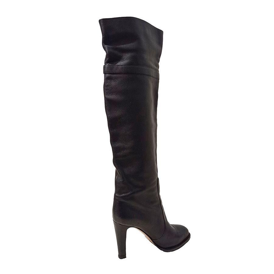 Leather Black color Total height cm 60 (236 inches) Heel height cm 11 (433 inches)
