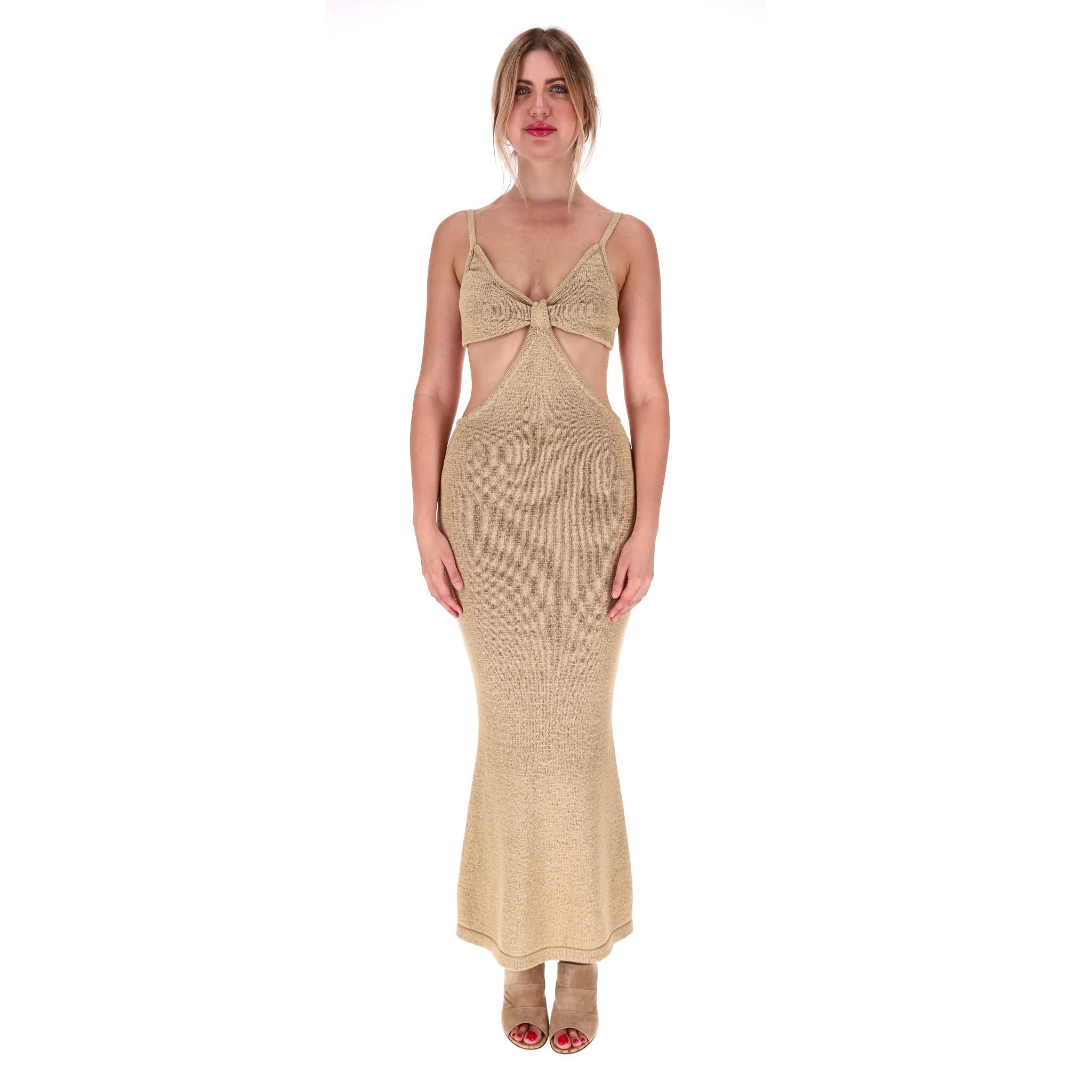 Cult Gaia Open-Panel Cotton Blend Knitted Dress

Gold 'Serita' dress designed with twisted knot to the front creating open-panel to the sides and rear.

Featuring V-Neck, shoulder straps and flared midi skirt.

Size – S

Condition – Very